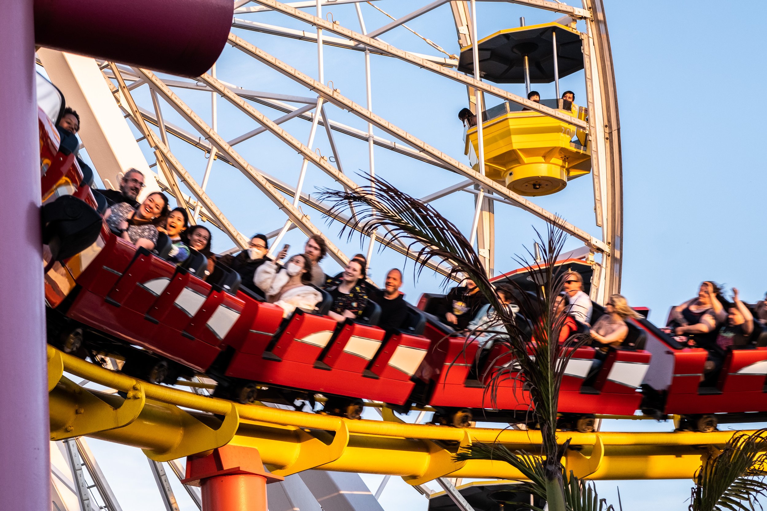  In Pacific Park, people ride the West Coaster,  on Thursday, April 20, 2023. Santa Monica Pier in Santa Monica, Calif. hosts Locals' Night every third Thursday with free programming from 4:00pm to 10:00pm. (Akemi Rico | The Corsair) 