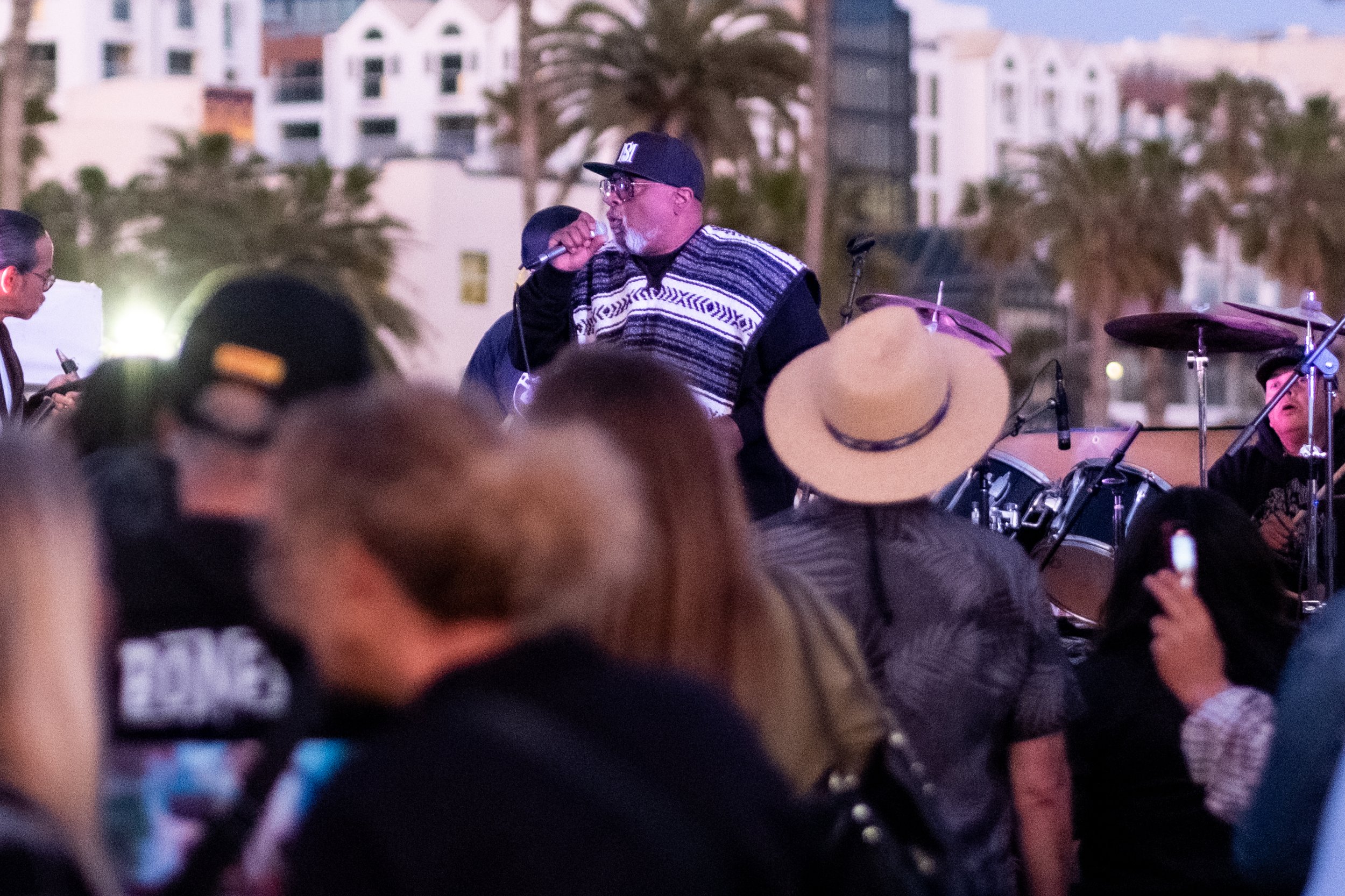  Lead singer of the Horny Toads on the mic at Locals' Night on the Santa Monica Pier on Thursday, April 20, 2023 on the parking deck in Santa Monica, Calif. The pier hosts Locals' Night every third Thursday with free programming from 4:00pm to 10:00p