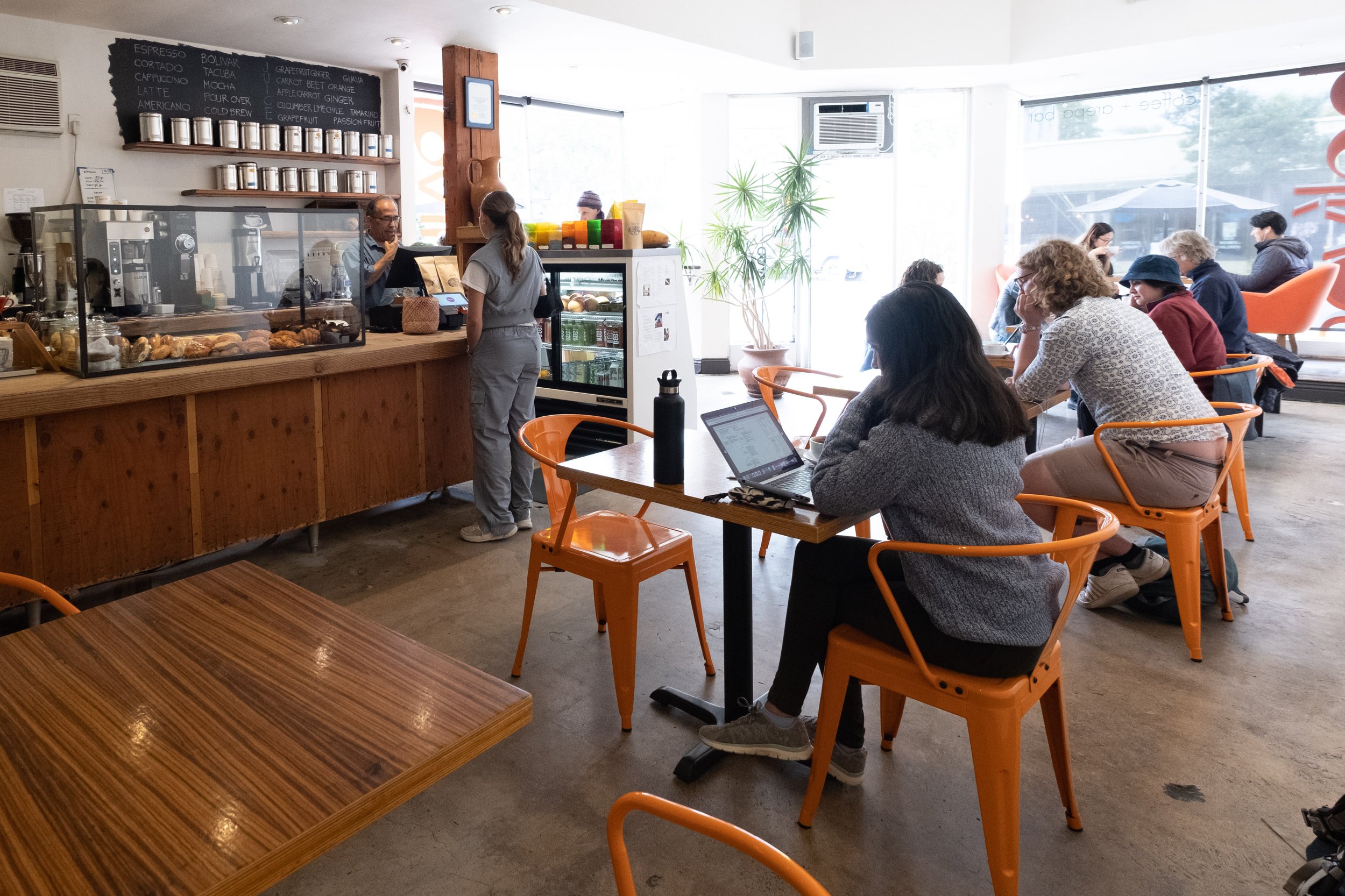  Patrons sit and work inside Bolivar Cafe, located on Ocean Park Blvd. and 18th St. In addition to the usual coffee drinks, they have a plethora of teas to choose from, along with fresh squeezed juices, sandwiches, pastries, and arepas, a Nicaraguan 