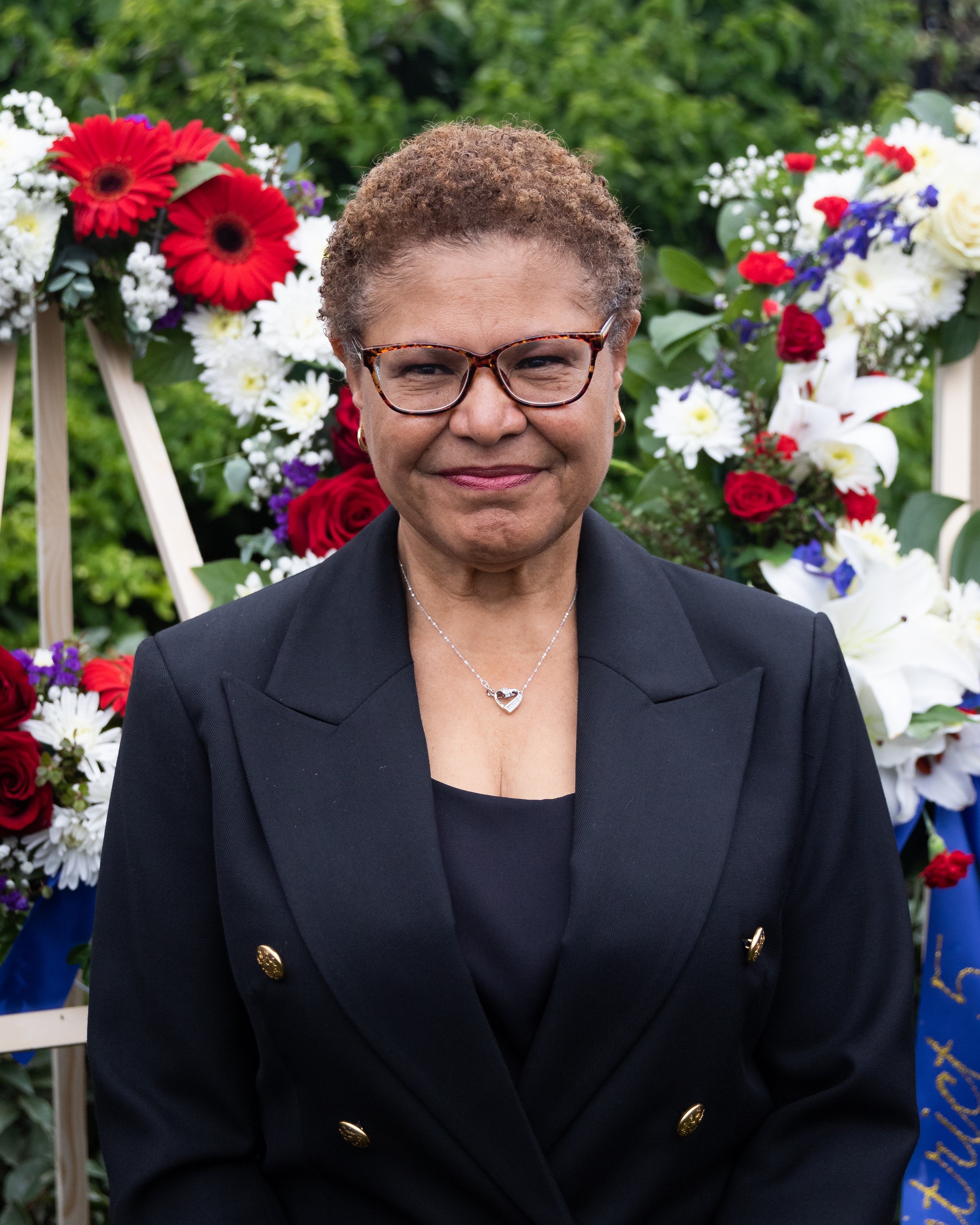  Los Angeles (LA) Mayor Karen Bass stands in front of the wreath for LA during the Memorial Day Celebration at LA National Cemetery in Los Angeles, Calif., on Monday, May 29, 2023. (Caylo Seals | The Corsair) 