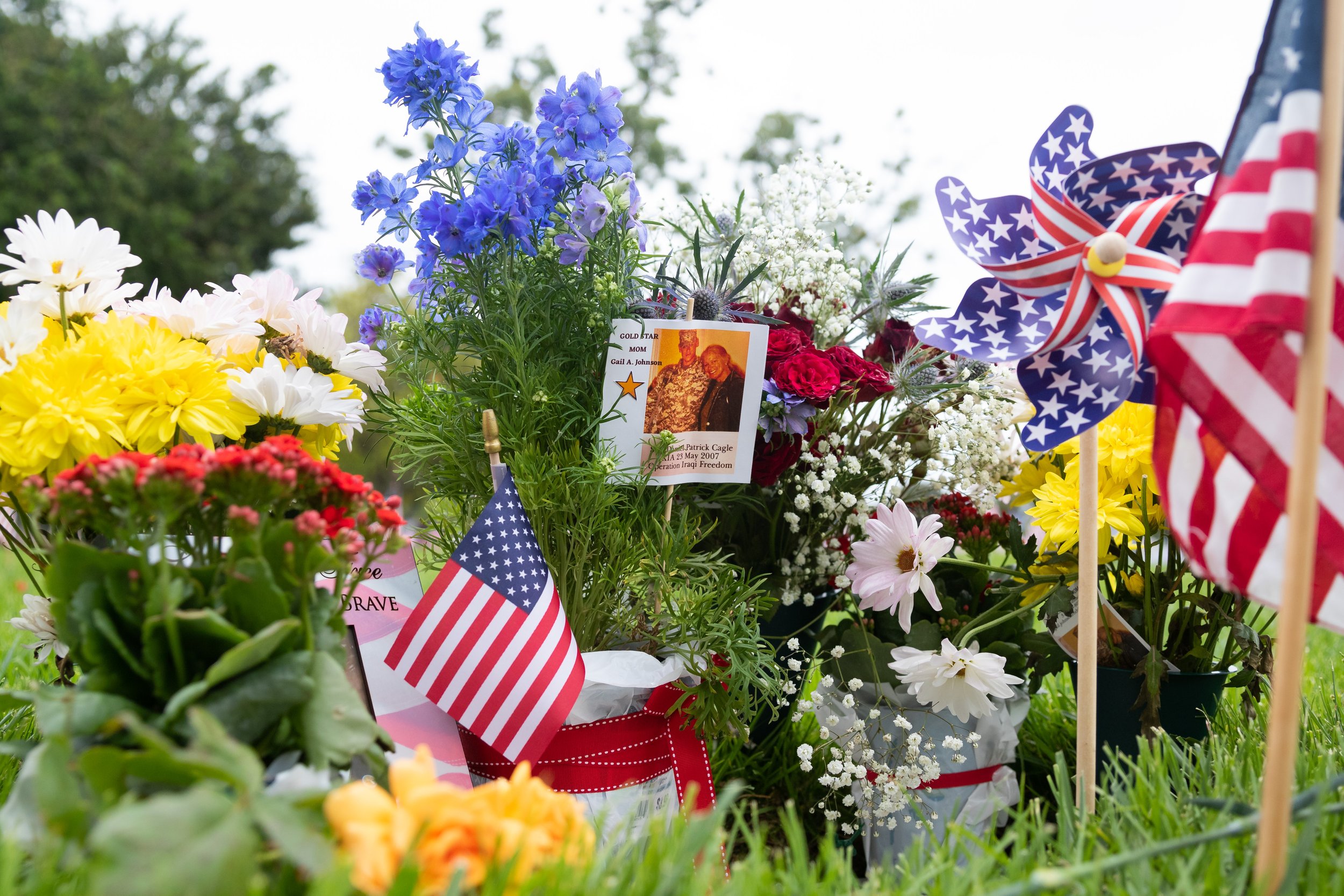  The grave of Daniel Patrick Cagle adorned with flowers from his family on Memorial Day at Los Angeles National Cemetery in Los Angeles, Calif., on Monday, May 29, 2023. Cagle was killed in action on May 23, 2007, during Operation Iraqi Freedom when 