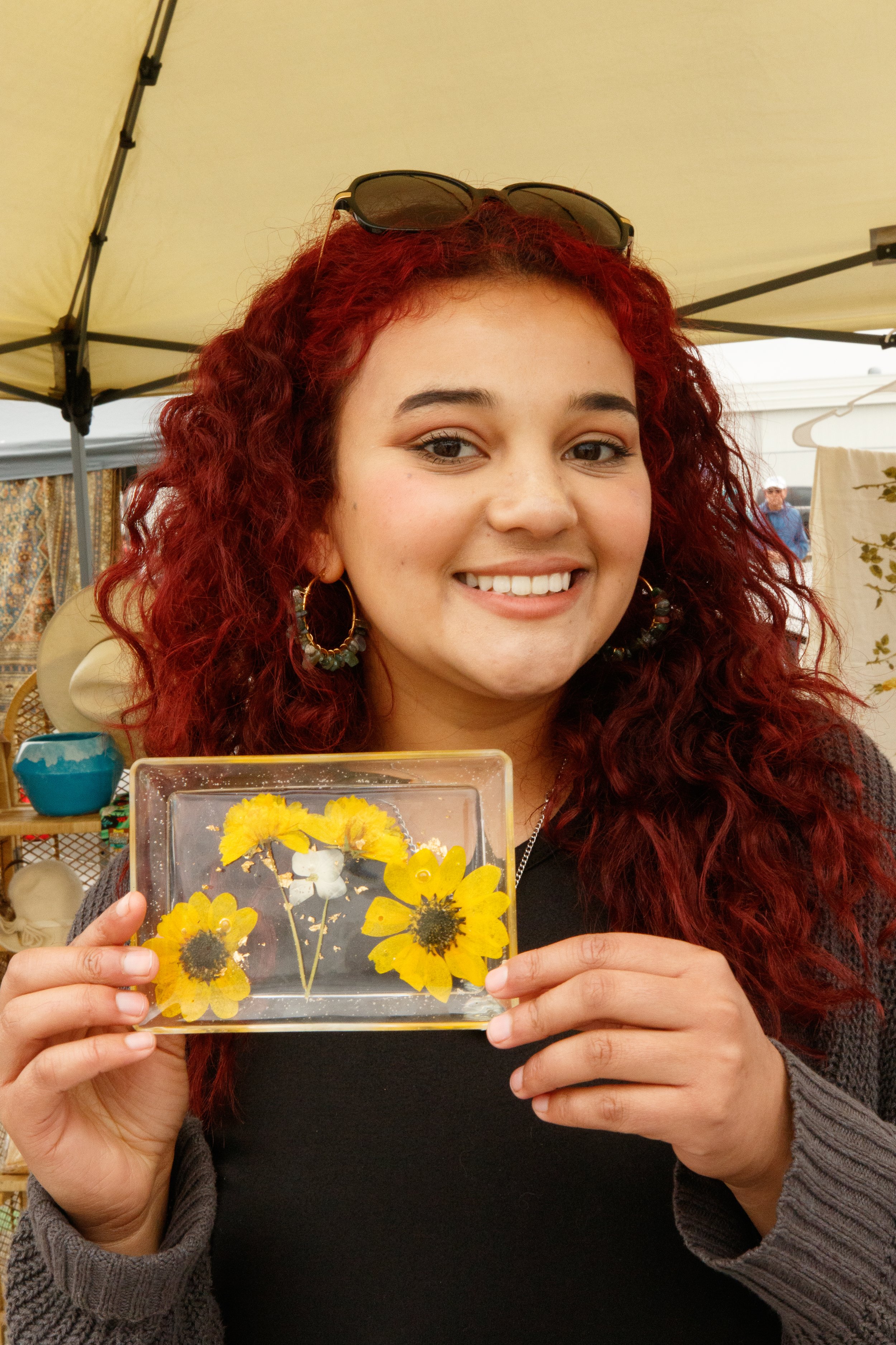  Gaby Chanel has been coming to market for two years now and her specialty making resin art with real flowers. May 28,2023 Santa Monica Airport parking lot, CA (Alejandro Contreras | The Corsair) 