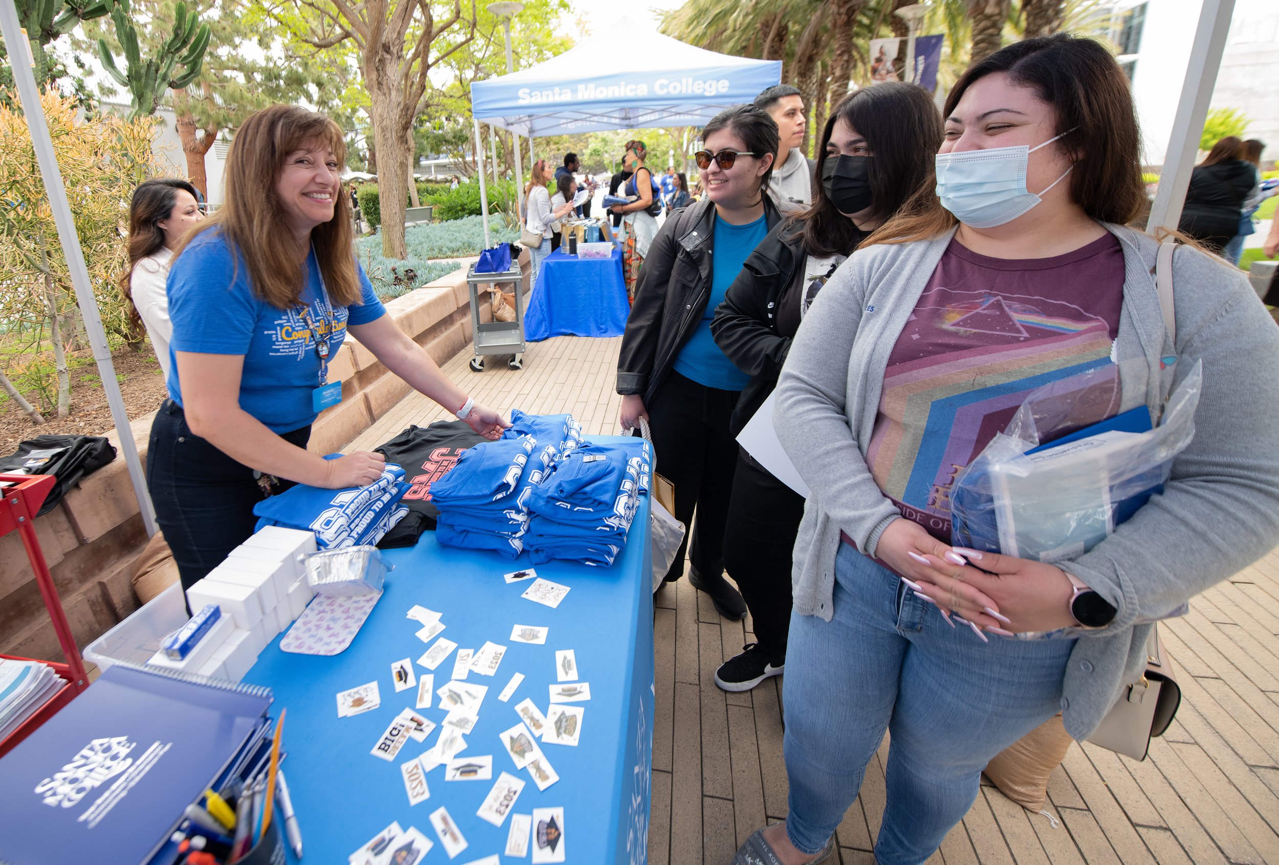  Students chose stickers and gear set up at Grad Fest Thursday, June 1 at Santa Monica College Main Quad ( Kevin Tidmore | TheCorsair ) 