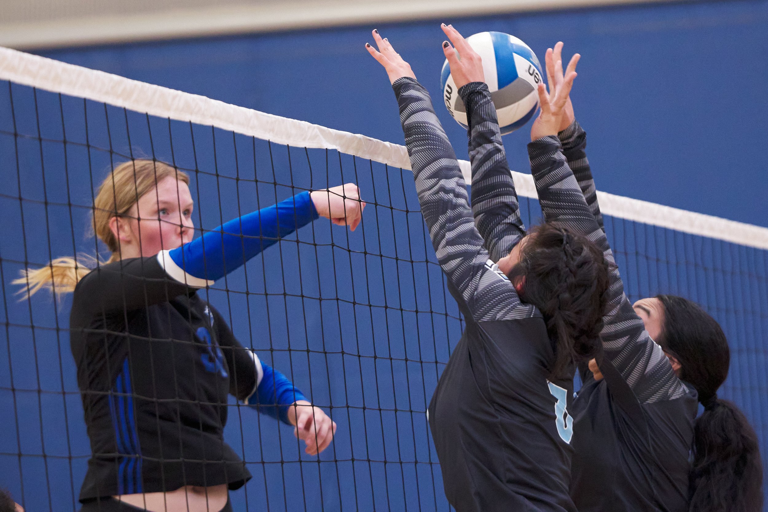  Cuyamaca College Coyotes' (right) Chelsea Hannibal and Kierrah Mamea block the ball sent by Santa Monica College Corsairs' Mylah Niksa (left) during the women's volleyball match on Wednesday, Sept. 6, 2023, at the SMC Gym in Santa Monica, Calif. The