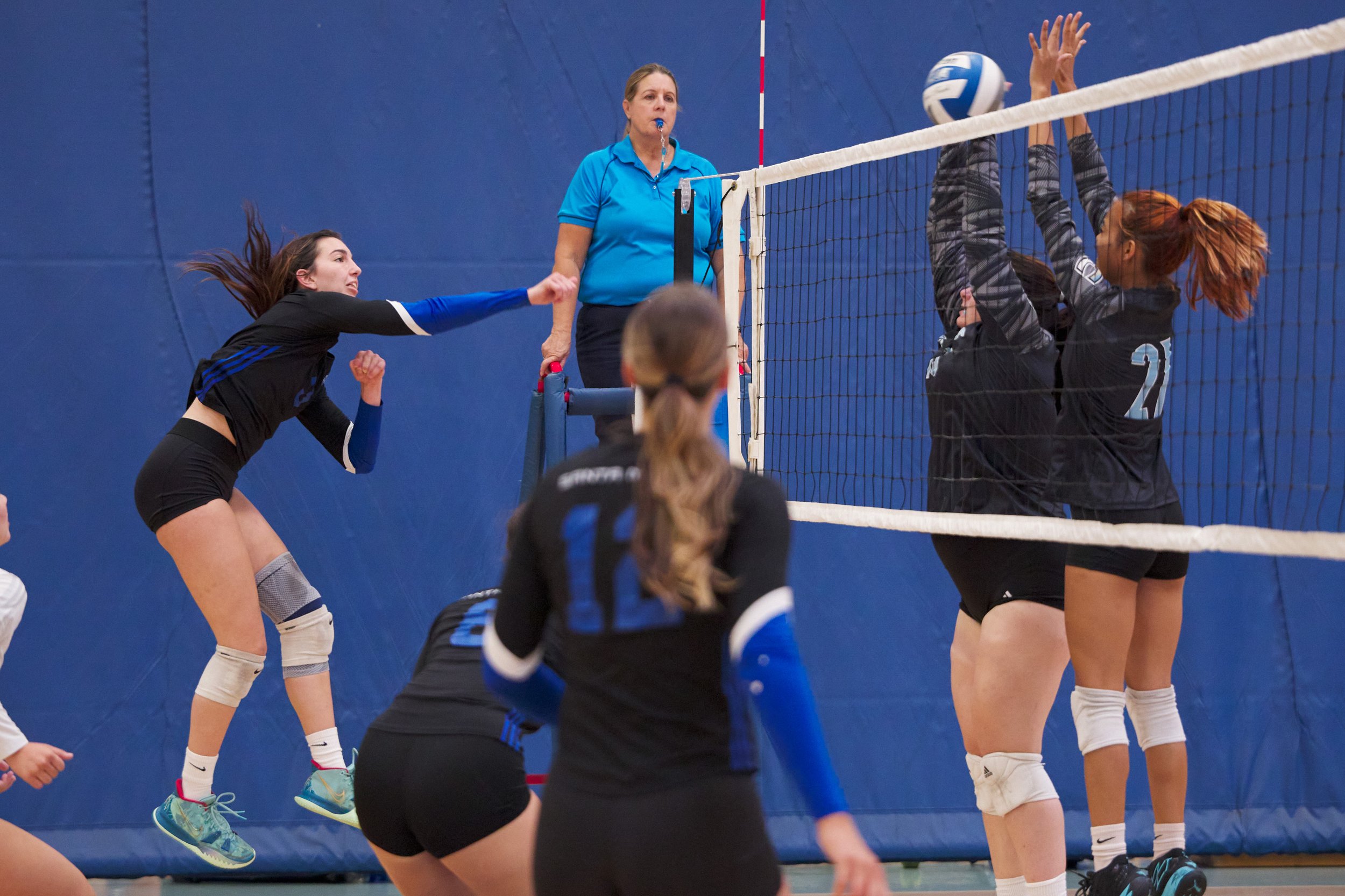  Santa Monica College Corsairs' Madison Schweitzer sends the ball, but is blocked by Cuyamaca College Coyotes' Heather Johnson and Jaden Cablayan during the women's volleyball match on Wednesday, Sept. 6, 2023, at the SMC Gym in Santa Monica, Calif. 
