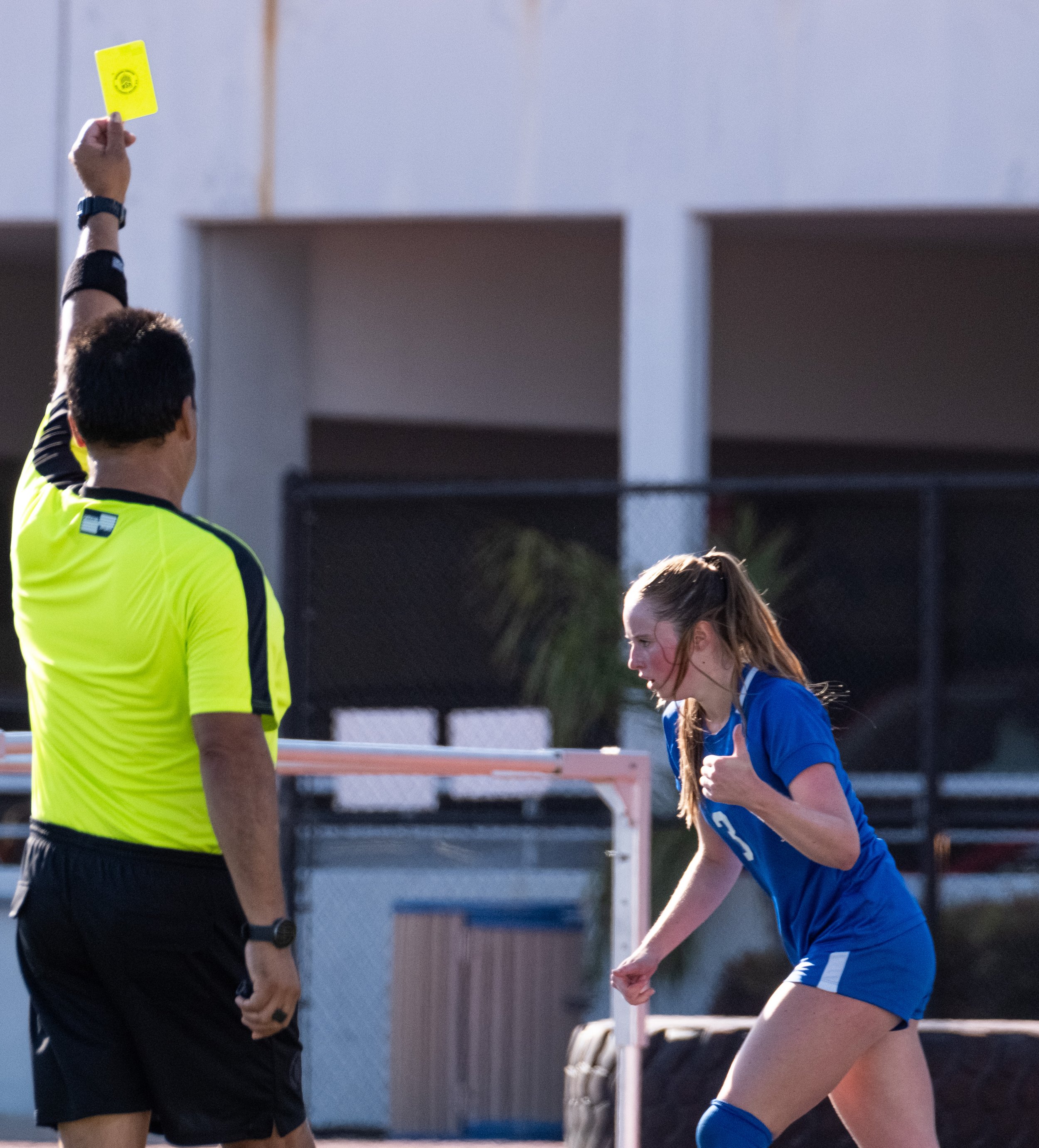  Santa Monica College defender Izzy Turner accepting her yellow card after an intentional foul against an LA Pierce player during their match on Tue. Sept. 12 on Corsair Field at Santa Monica, Calif. (Danilo Perez | The Corsair) 