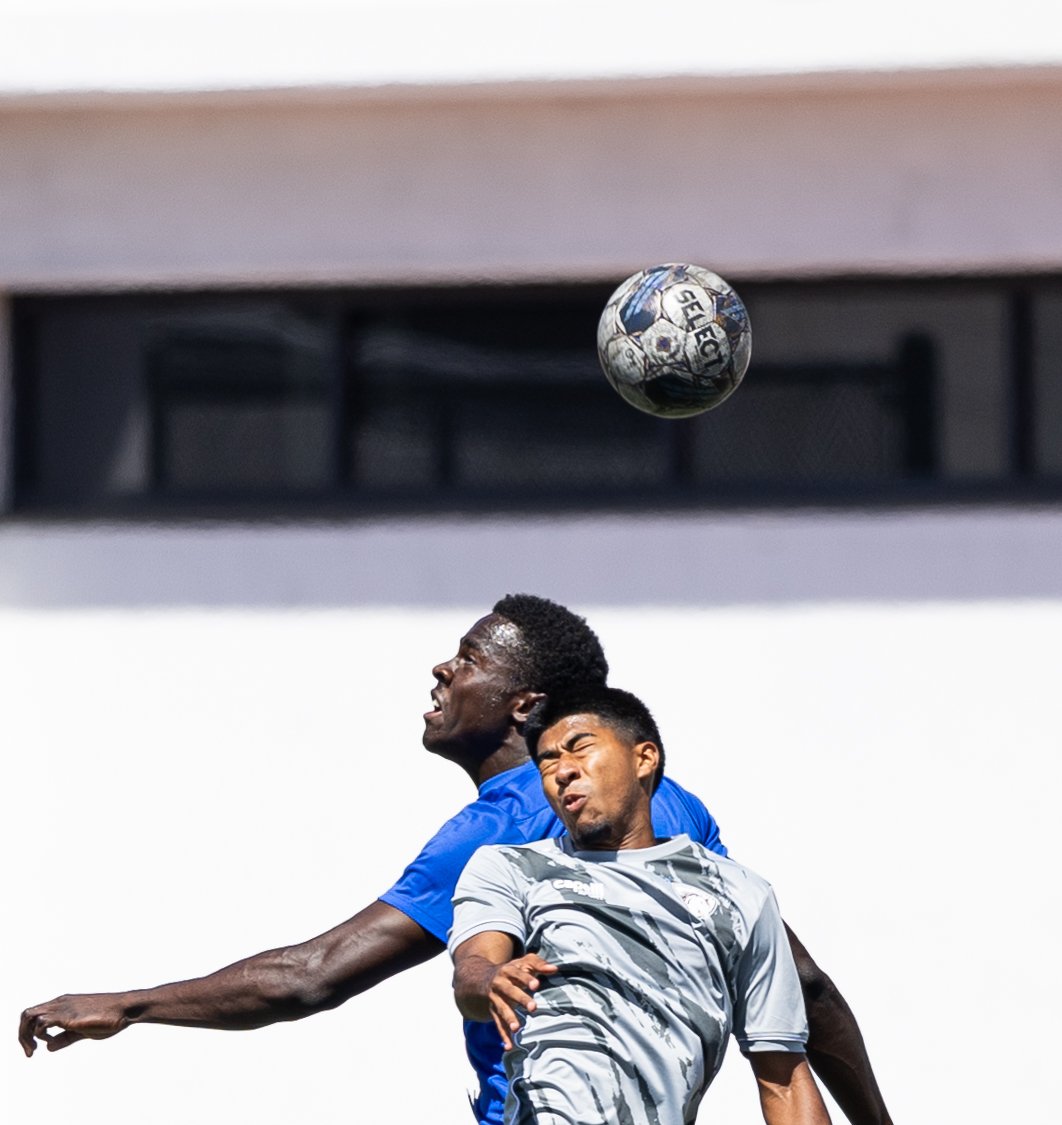  Santa Monica College men's soccer forward Philip Hephzibah(B) and Norco College defender Marcus Carbajal(F) both going for the ball during their match on Tue. Sept. 12 on Corsair Field at Santa Monica, Calif. (Danilo Perez | The Corsair) 