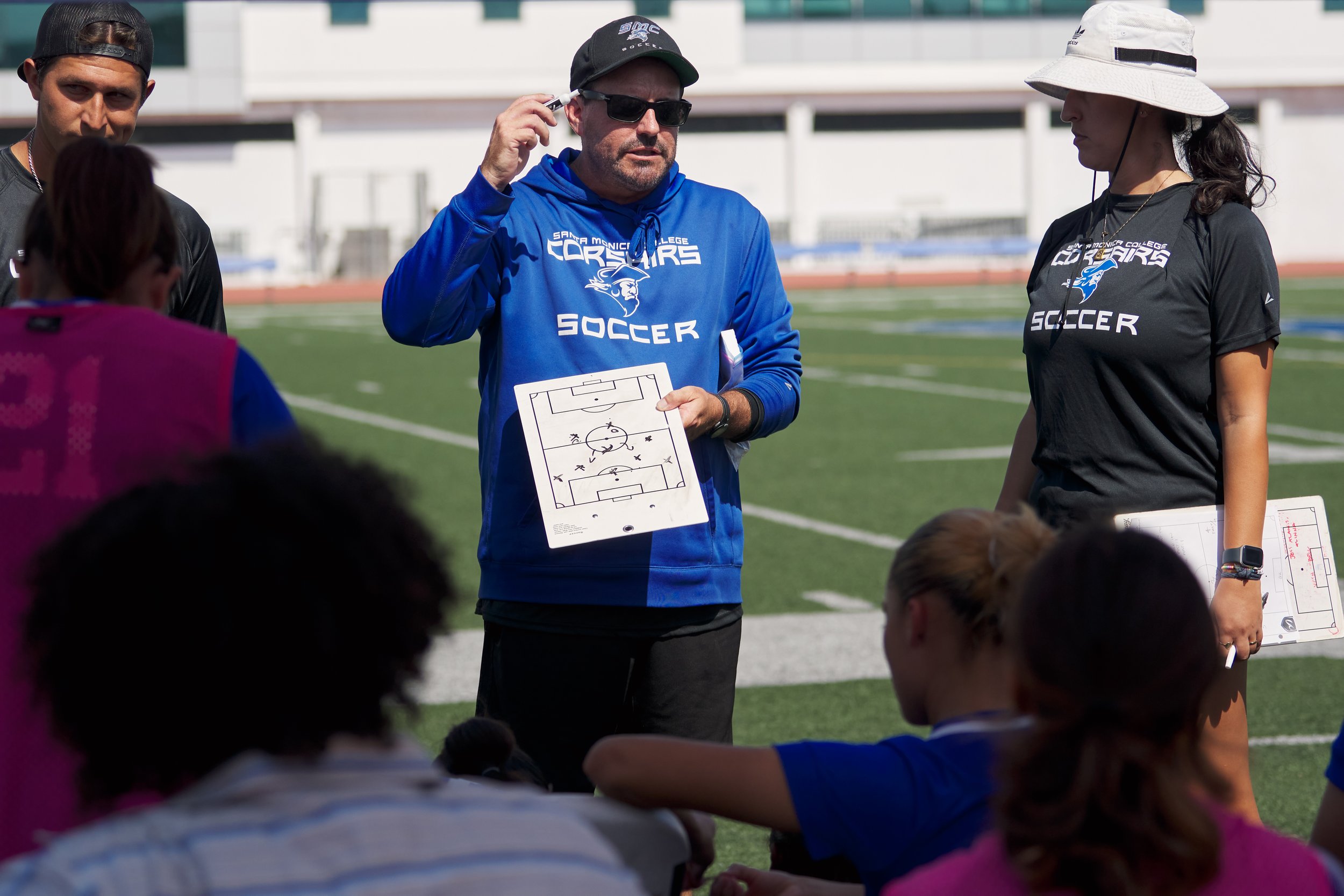  Santa Monica College Corsairs Women's Soccer Head Coach Aaron Benditson talks to the team at halftime during the match against the Long Beach City College Vikings on Friday, Sept. 15, 2023, at Corsair Field in Santa Monica, Calif. The Corsairs tied 