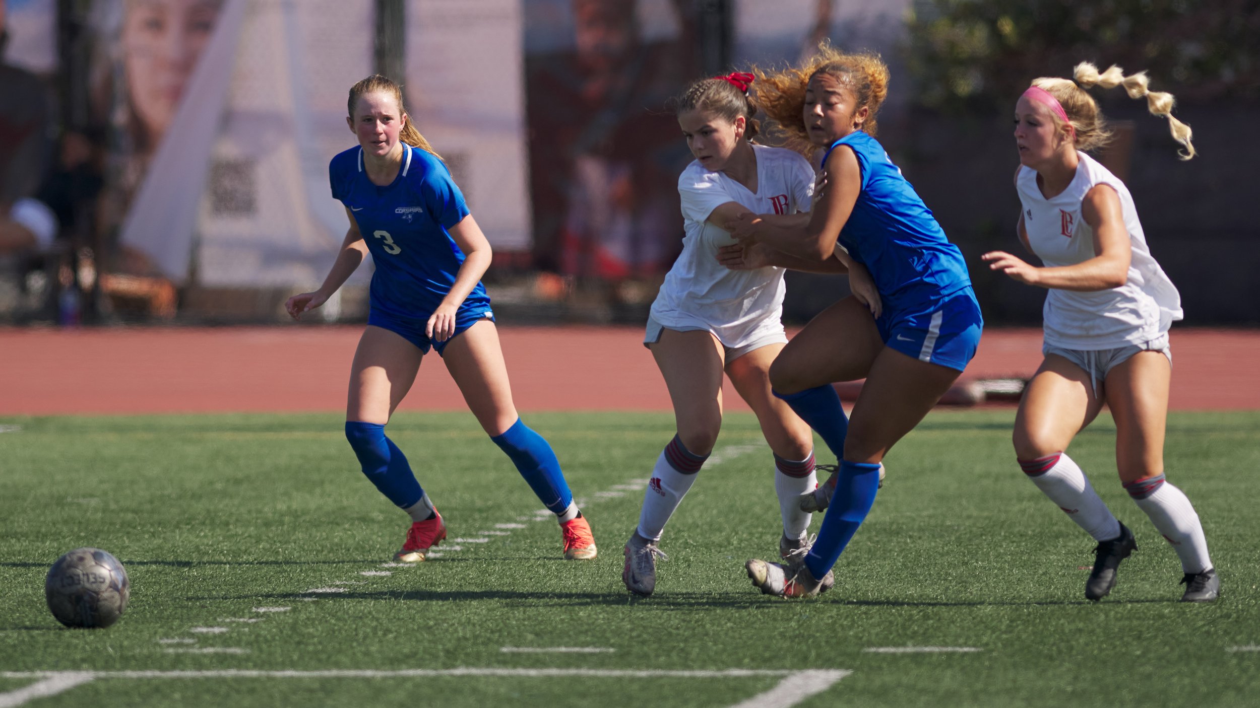  Santa Monica College Corsairs' Izzy Turner (left) and Tia Lucas (center right), and Long Beach City College Vikings' Abbie Campos (center left) and Hannah Marshall (right) during the women's soccer match on Friday, Sept. 15, 2023, at Corsair Field i