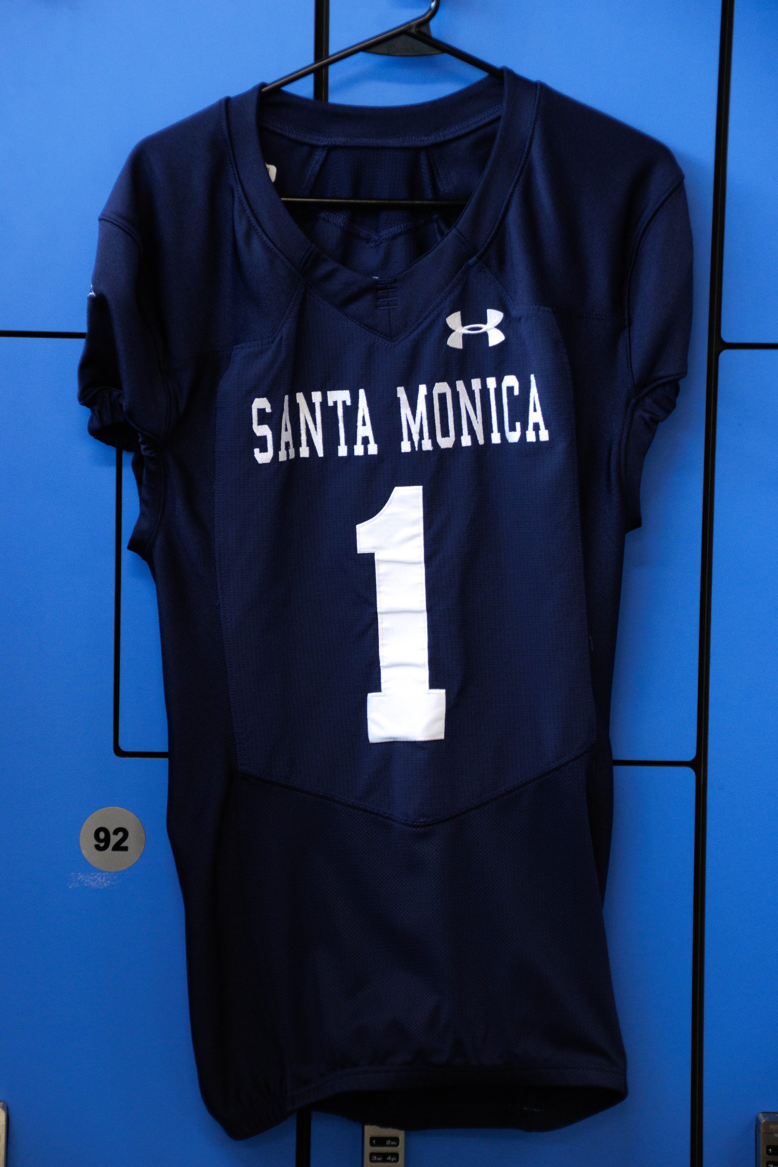  A Santa Monica College (SMC) Men's Football Jersey hung in the men's locker room in the Corsair Gymnasium on the SMC main campus, Santa Monica, Calif. on Sept. 07, 2023. This one in particular is for home matches. (Danniel Sumarkho | The Corsair) 