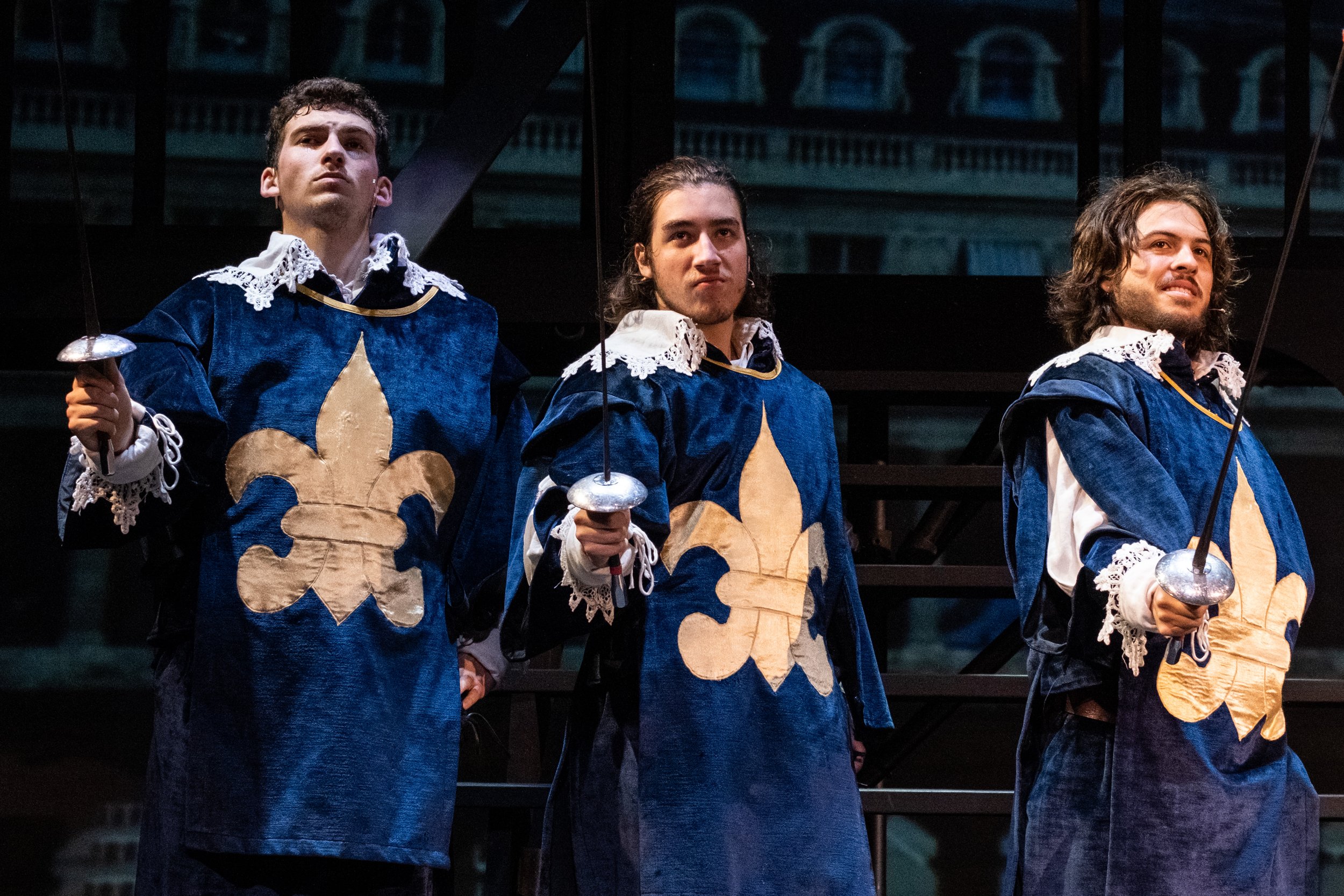  From L to R, the three Musketeers, Porthos, Athos, and Aramis, played by Alex Cole, Simon Oviedo and Keelin Jayne, respectively, on stage at the Santa Monica College Theater Department Main Stage on the Main Campus in Santa Monica, Calif. during the