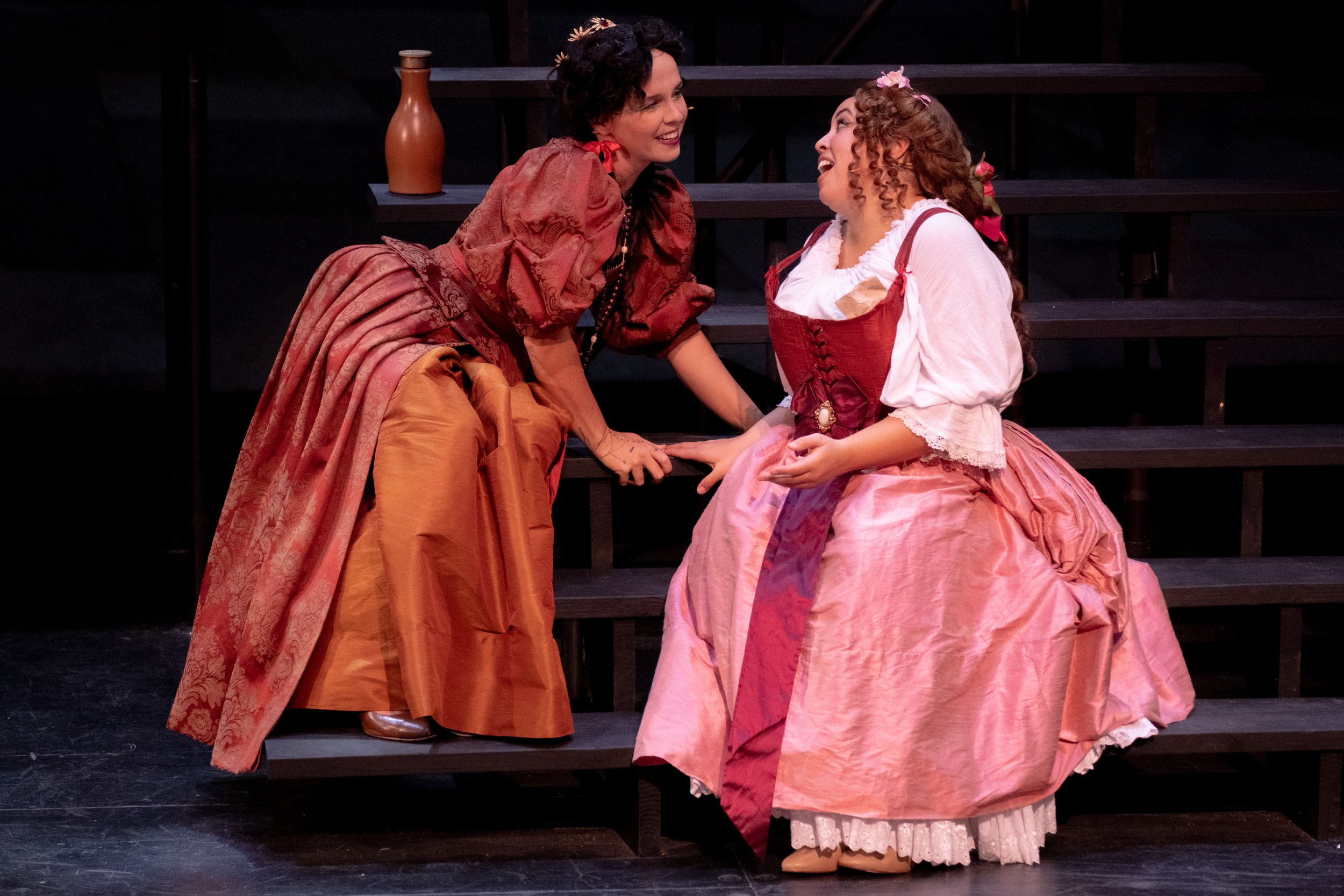  Megan Winberg, playing the role of Milady de Winter, as she attempts to get information from Jazzy Skjold-Terrell, playing Constance Bonacieux on stage at the Santa Monica College Theater Department Main Stage on the Main Campus in Santa Monica, Cal