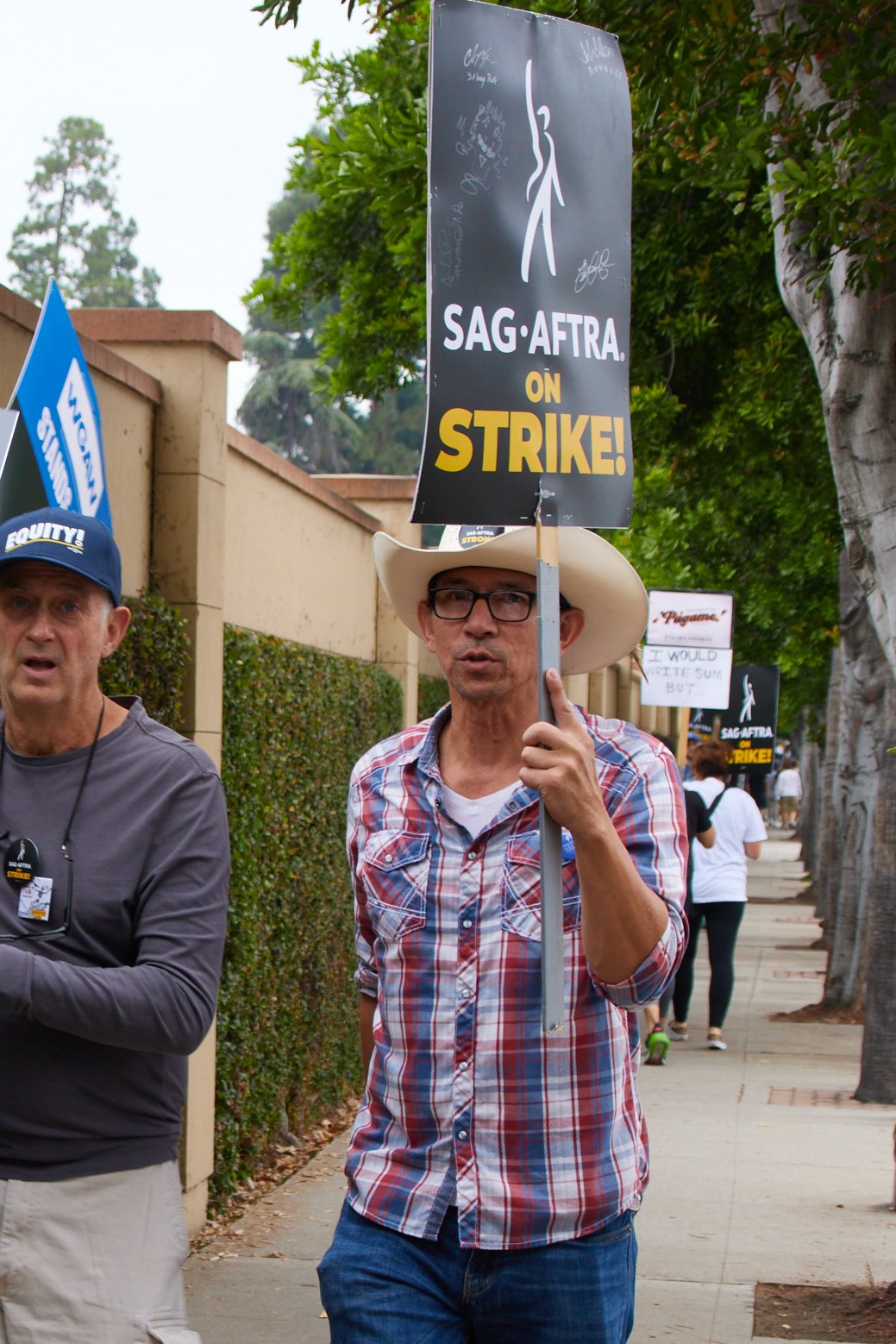  Actor John A. Lorenz marches alongside a WGA member during the SAG-AFTRA strike in front of Warner Bros. Studios, Burbank, Calif., on Sept 29, 2023. (Danniel Sumarkho | The Corsair) 