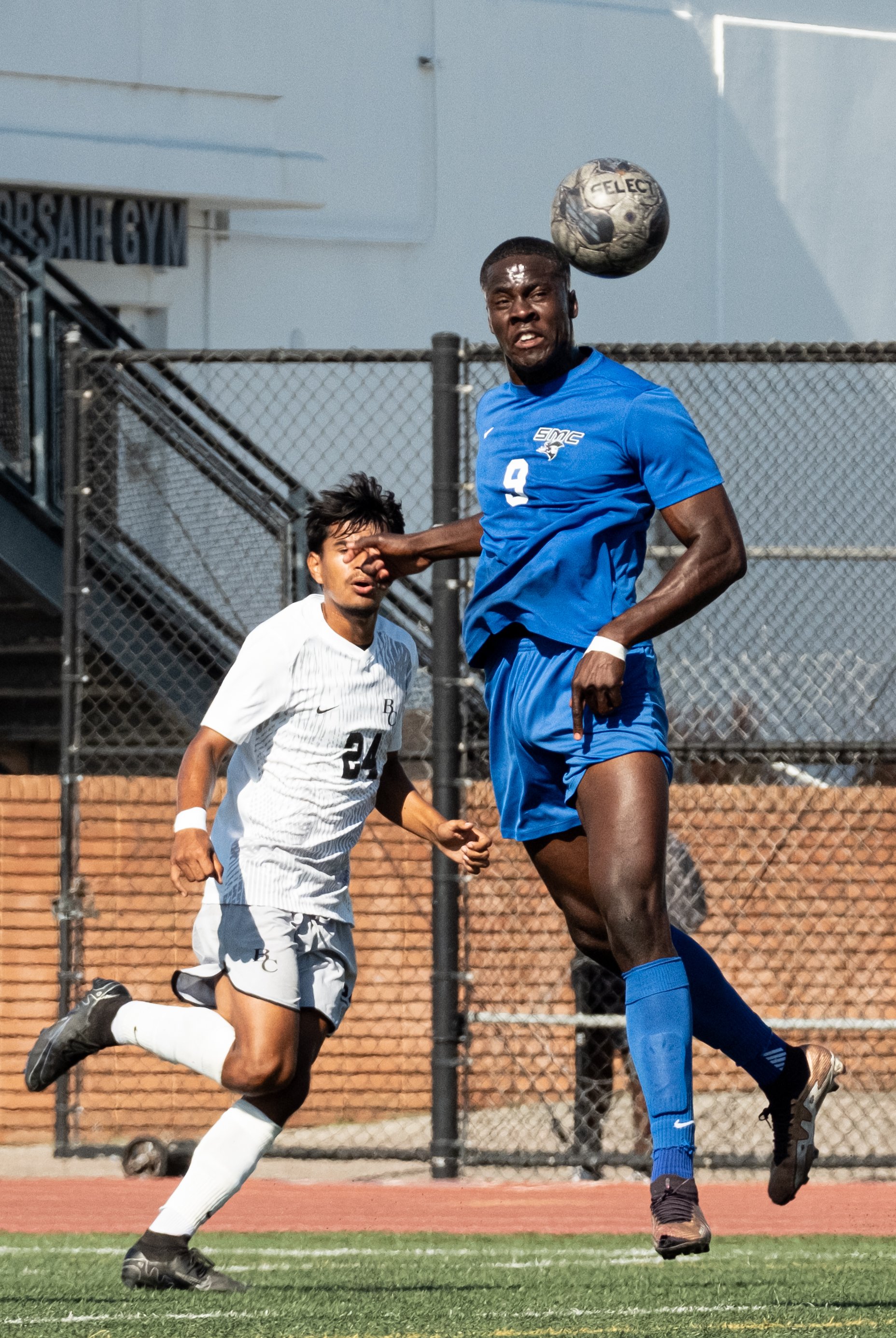  Santa Monica College(SMC) men's soccer forward Philip Hephzibah(9) attempting a header to goal but being blocked by Bakersfield Renegade goalie Hairo Rodriguez(not pictured) on Tues, Oct. 3. SMC would go and shutout the Renegades with a score of 3-0