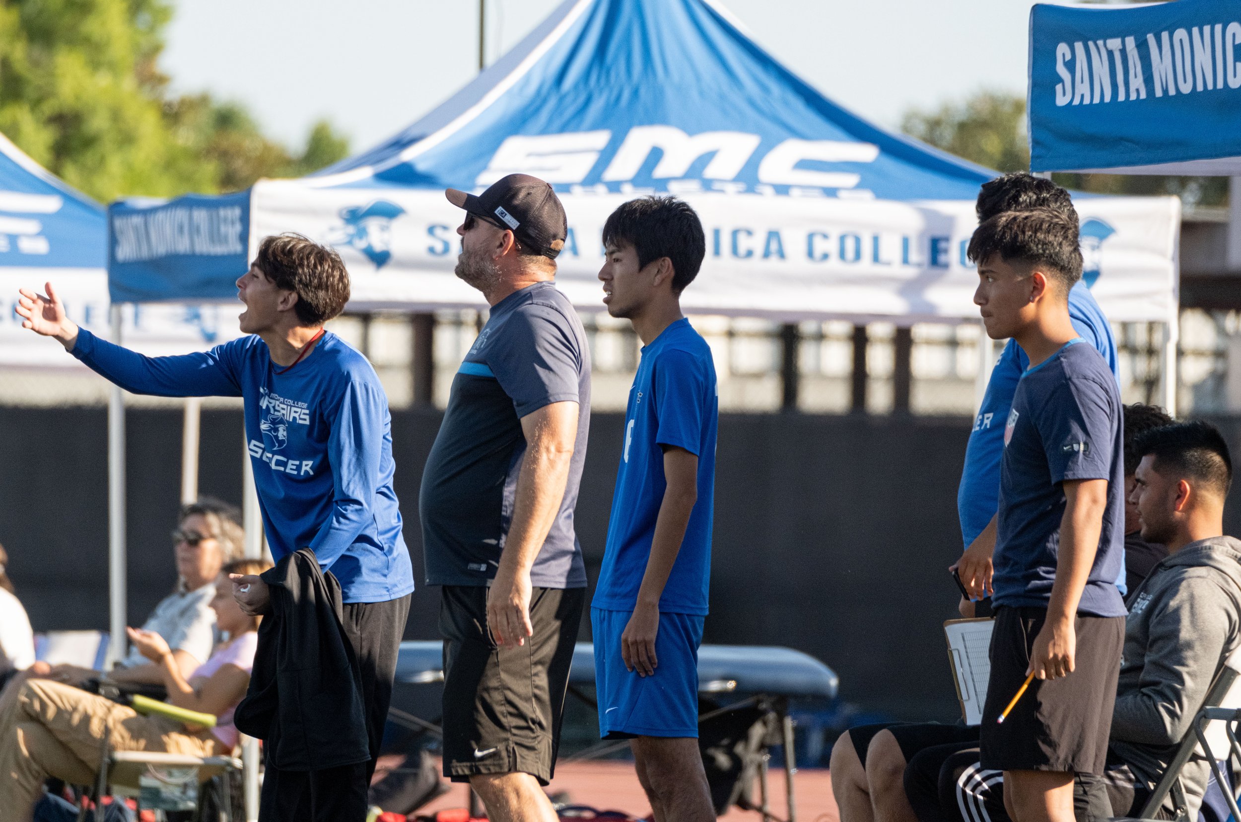  Santa Monica College(SMC) men's soccer team and head coach Tim Pierce get closer to the pitch to argue with referee over a foul against the Bakersfield Renegade on Tues, Oct. 3. SMC would go and shutout the Renegades with a score of 3-0 at Corsair F