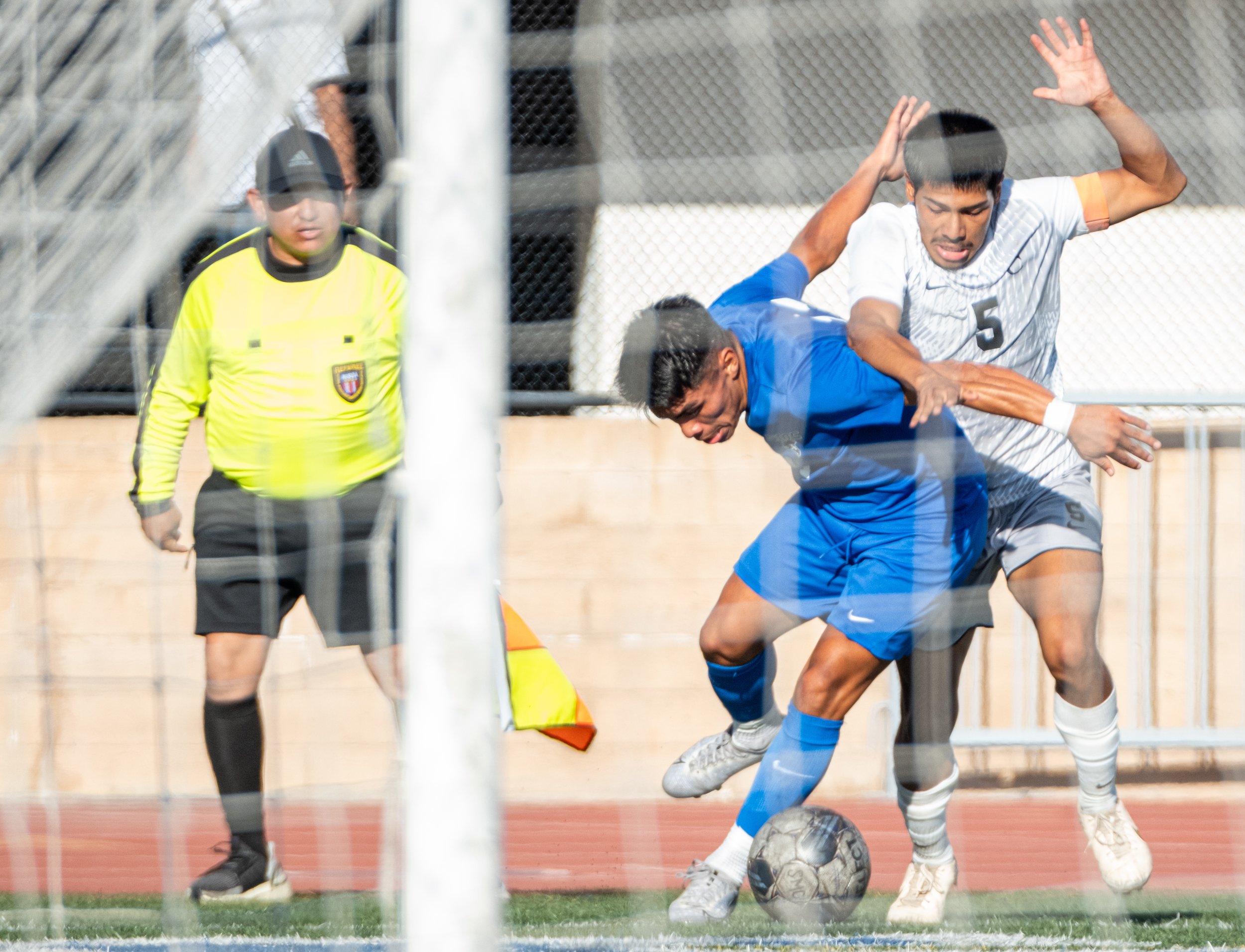  Santa Monica College(SMC) men's soccer defender Gare Arai(L) playing time against Bakersfield Renegade defender Jonathan Juarez(5) on Tues, Oct. 3. SMC would go and shutout the Renegades with a score of 3-0 at Corsair Field in Santa Monica, Calif. (