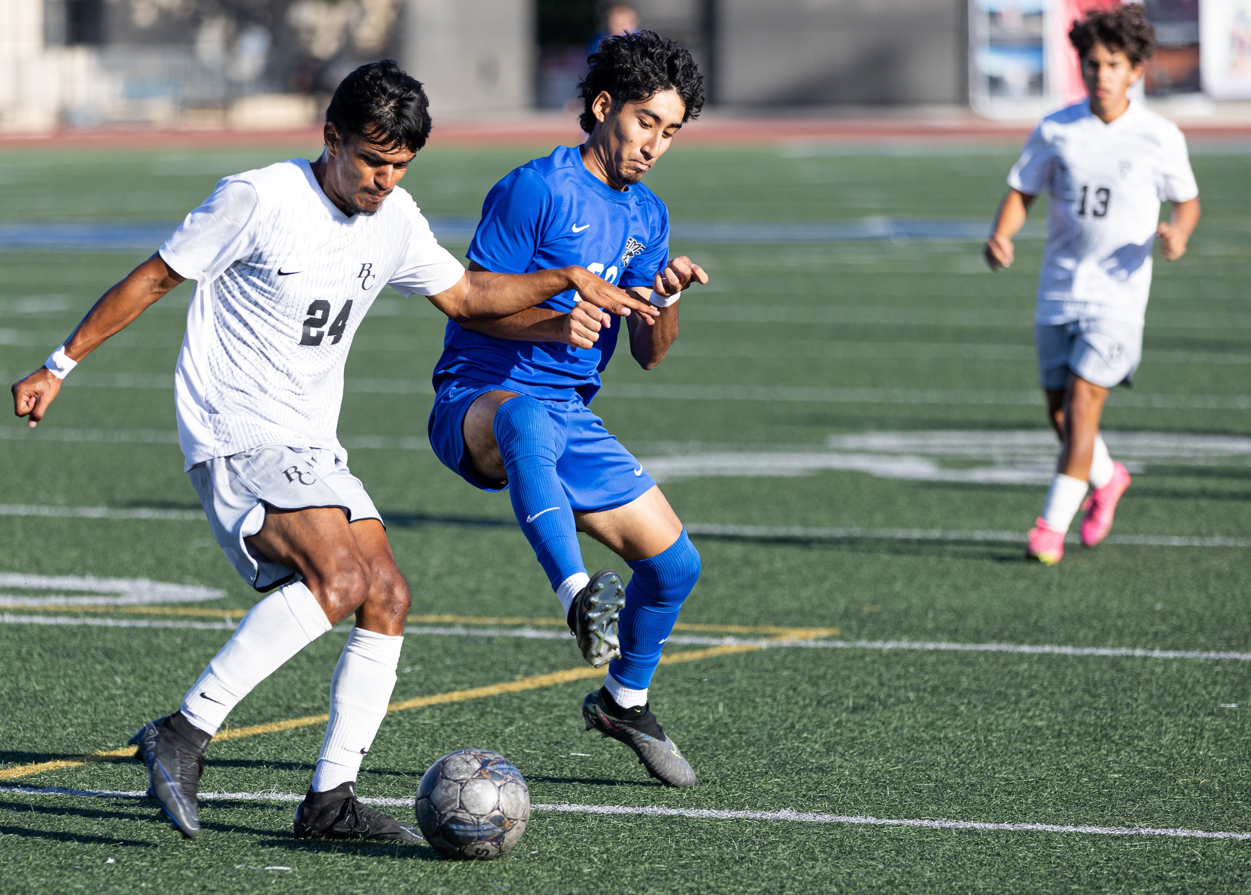  Santa Monica College(SMC) men's soccer midfielder Alex Hernandez(R) attempting to take the ball away from Bakersfield Renegade defender Joe Estrada(24) on Tues, Oct. 3. SMC would go and shutout the Renegades with a score of 3-0 at Corsair Field in S