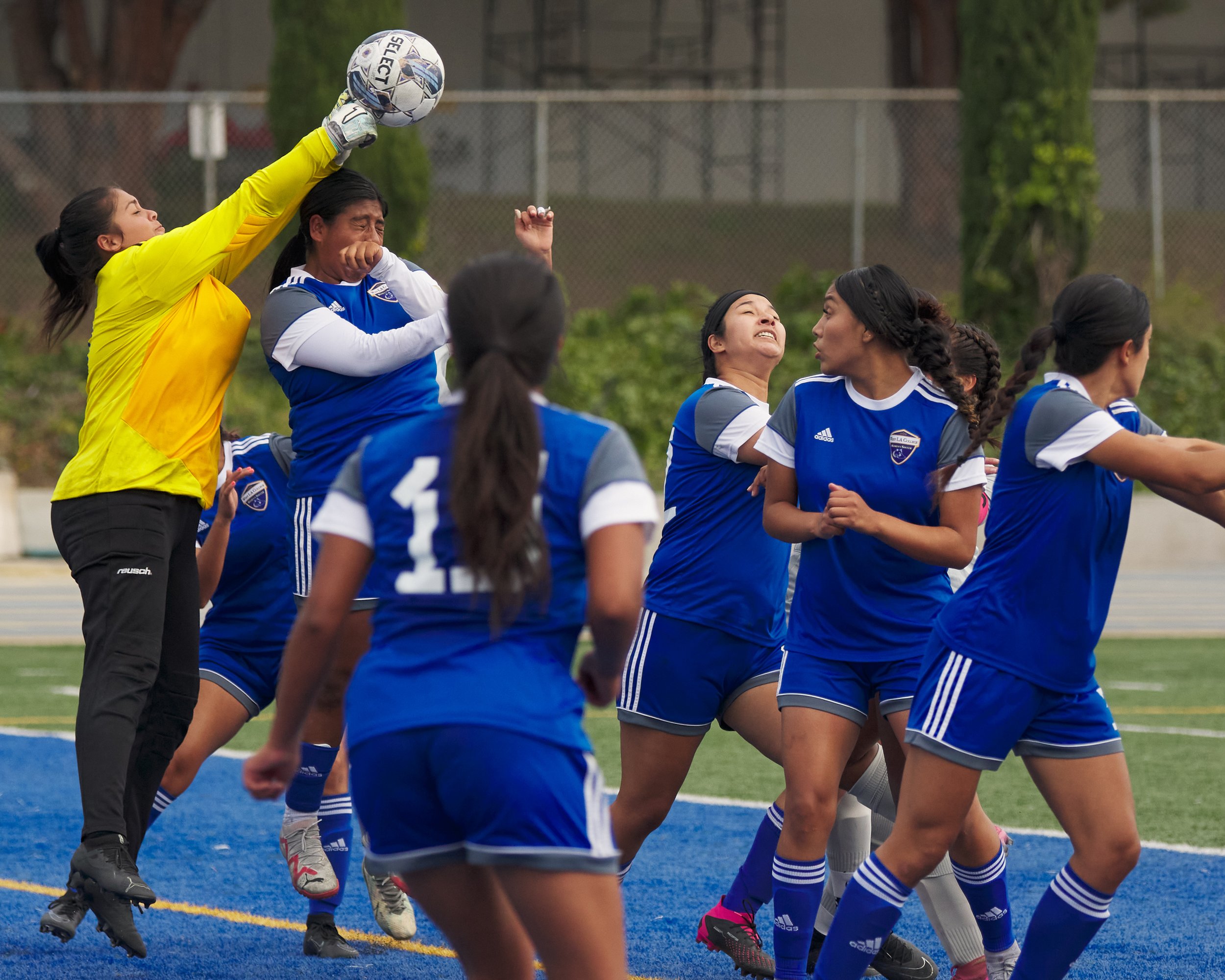  West Los Angeles College Wildcats' goalkeeper Jenna Sosa (left) blocks the ball during the women's soccer match against the Santa Monica College Corsairs on Friday, Sept. 29, 2023, at Wildcat Stadium in Los Angeles, Calif. The Corsairs won 5-0. (Nic