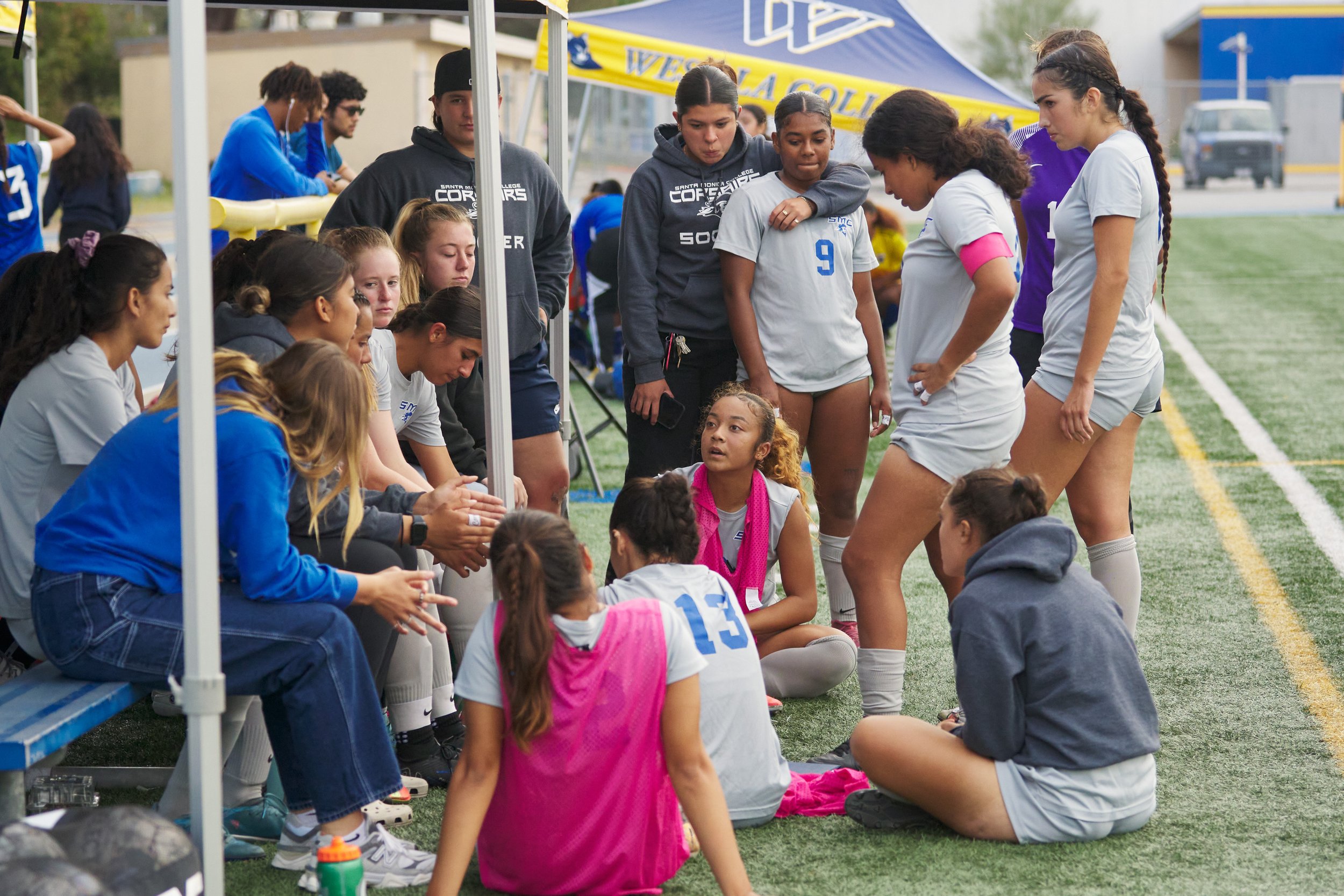  Santa Monica College Corsairs' Tia Lucas (center, seated) talks to the team during intermission at the women's soccer match against the West Los Angeles College Wildcats on Friday, Sept. 29, 2023, at Wildcat Stadium in Los Angeles, Calif. The Corsai