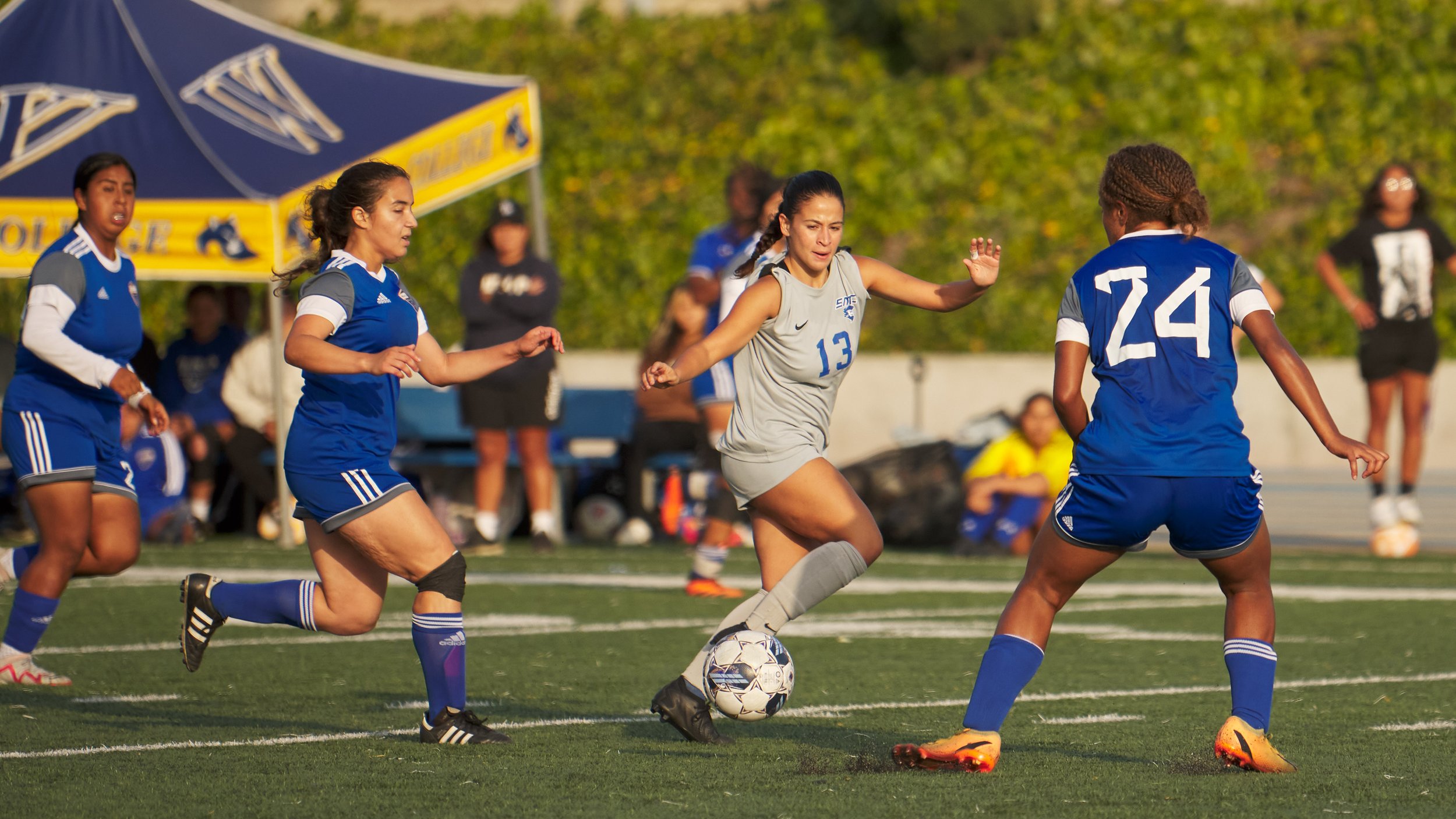  Santa Monica College Corsairs' Lia Agapitos (center right) and West Los Angeles Wildcats' Emely Sernas (left), Clara De Carvalho (center left), and Akanisi Sorovakanrua (right) during the women's soccer match on Friday, Sept. 29, 2023, at Wildcat St