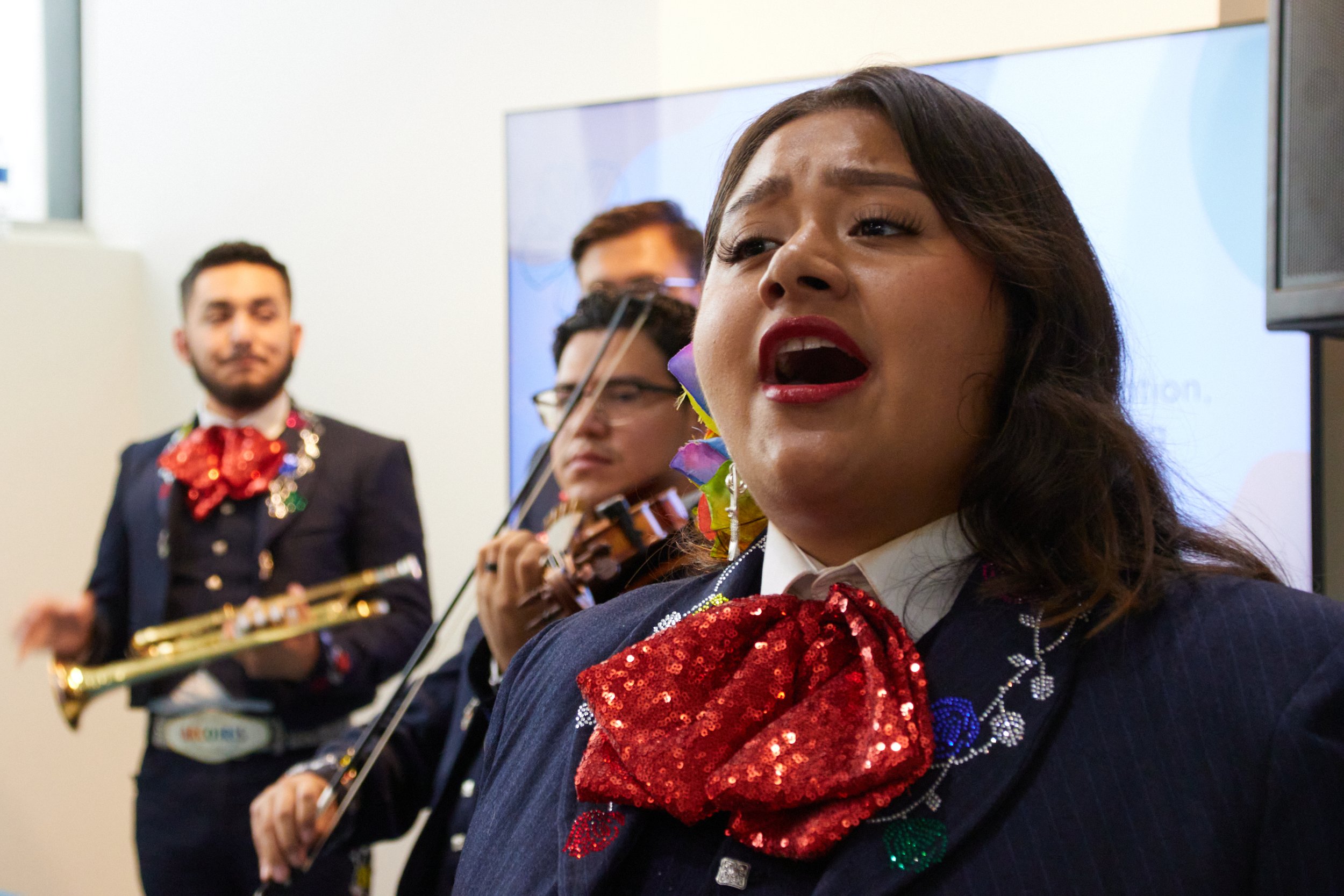 A mariachi band member sings in front of her band at the grand opening of the Student Equity Center at SMC main campus, Santa Monica, Calif., on Oct 5, 2023. (Danniel Sumarkho | The Corsair) 