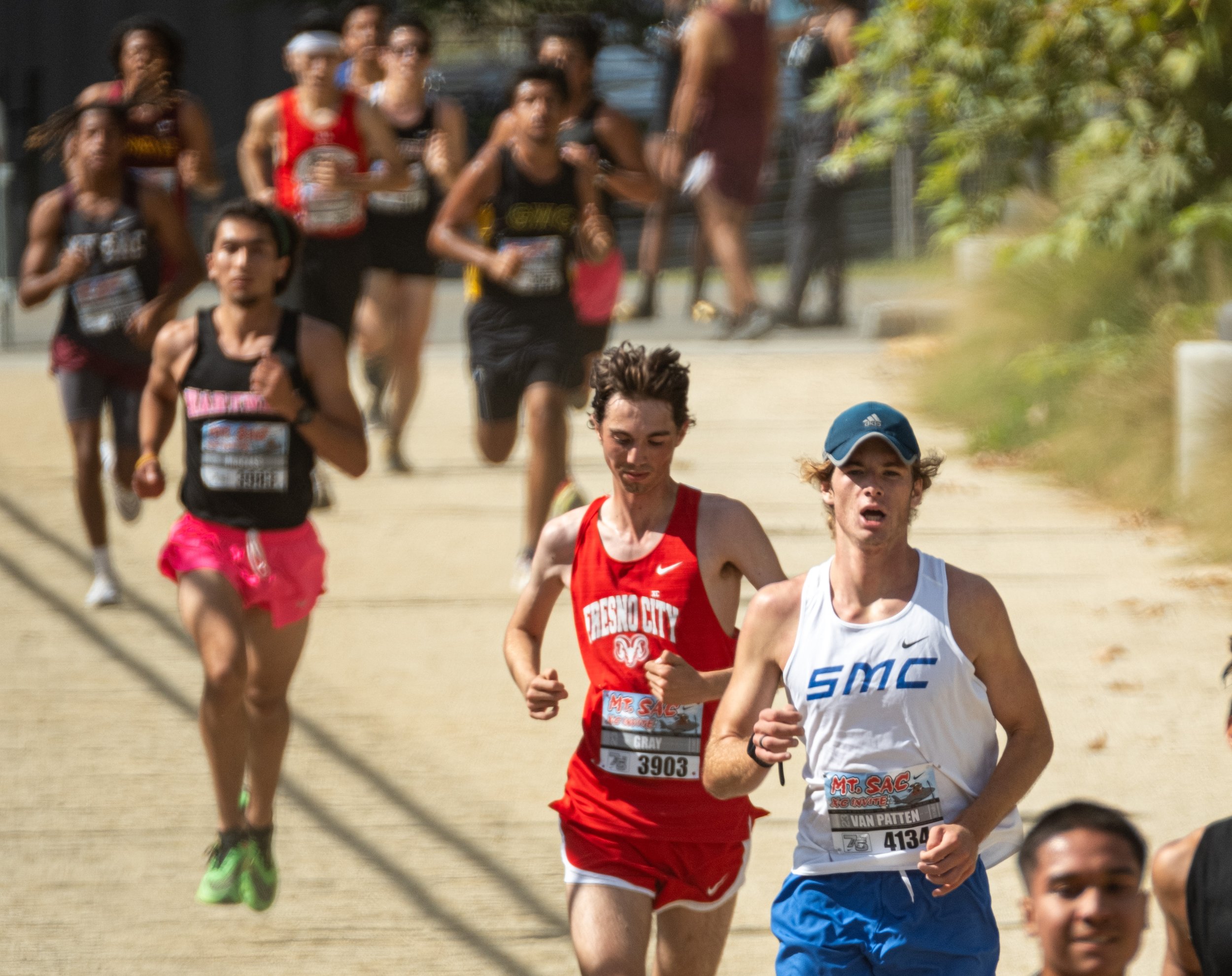  Jesse Van Patten(4134,SMC) running alongside others before reaching the finish line at the MT. SAC Cross Country Invitational on Friday, Oct 13 at MT. SAC in Walnut, Calif. (Danilo Perez | The Corsair) 