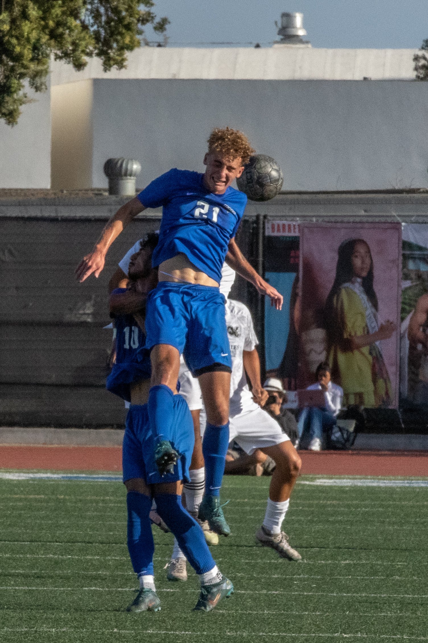  Santa Monica Corsairs' defender Marcus Hevesy-Rodriguez (21) leaps in the air to head the ball on Friday, Oct. 13, 2023 at Corsair Field in Santa Monica, Calif. Los Angeles during the men's soccer match against the Los Angeles Mission College Eagles