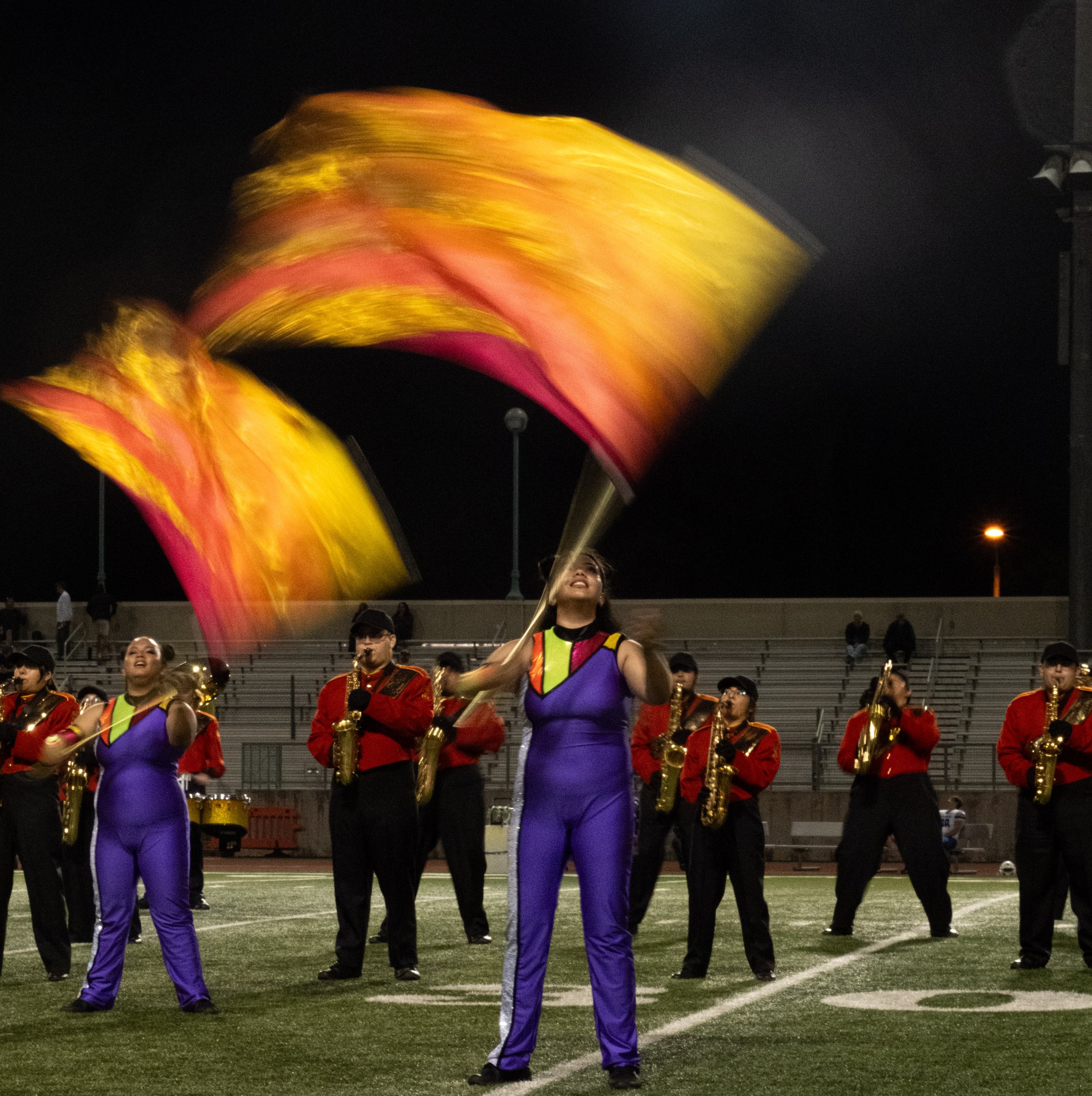  Pasadena City College(PCC) color gaurd throwing their flags during halftime at Robinson Stadium in PCC campus on Saturday, Oct. 14 Walnut, Calif. (Danilo Perez | The Corsair) 