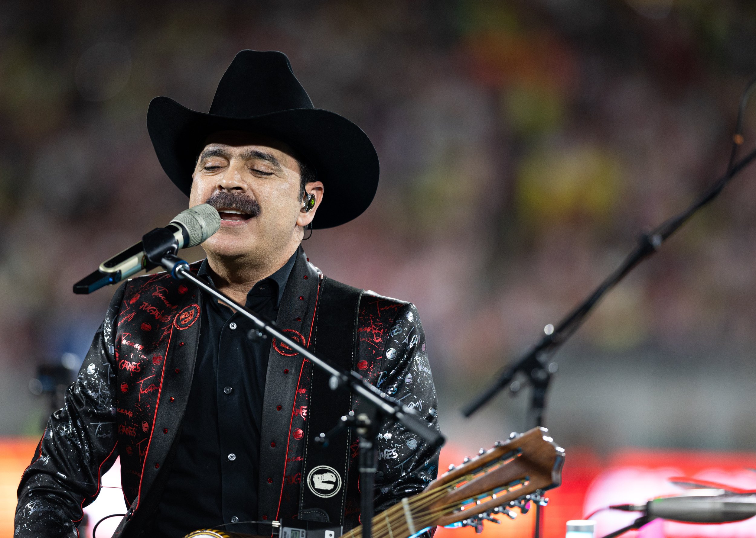  Los Tucanes de Tijuana singer Mario Quintero Lara performing during halftime of El Clasico de Mexico at the Rose Bowl in Pasadena, Calif. on Sunday, Oct. 15. (Danilo Perez | The Corsair) 