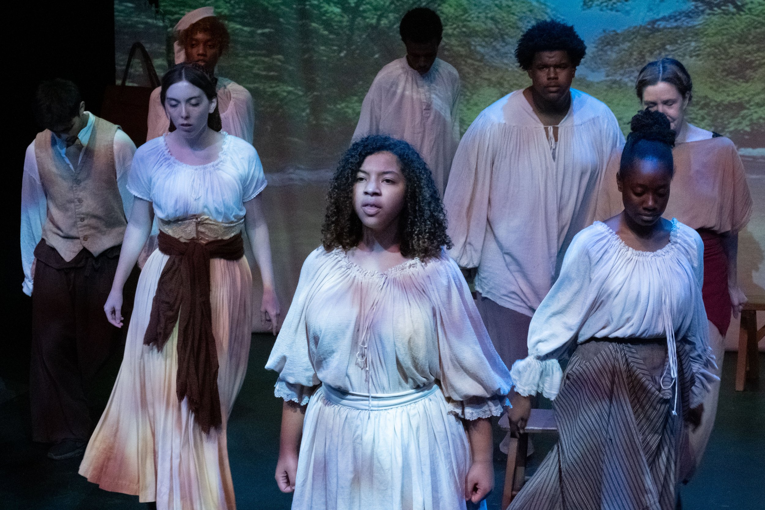  The cast of "By The River Rivanna," surround Cosette Okker (center) during the play performed on Tuesday Oct. 17th, 2023 in Santa Monica, Calif. at the Santa Monica Colllege Studio Stage. (Akemi Rico | The Corsair) 
