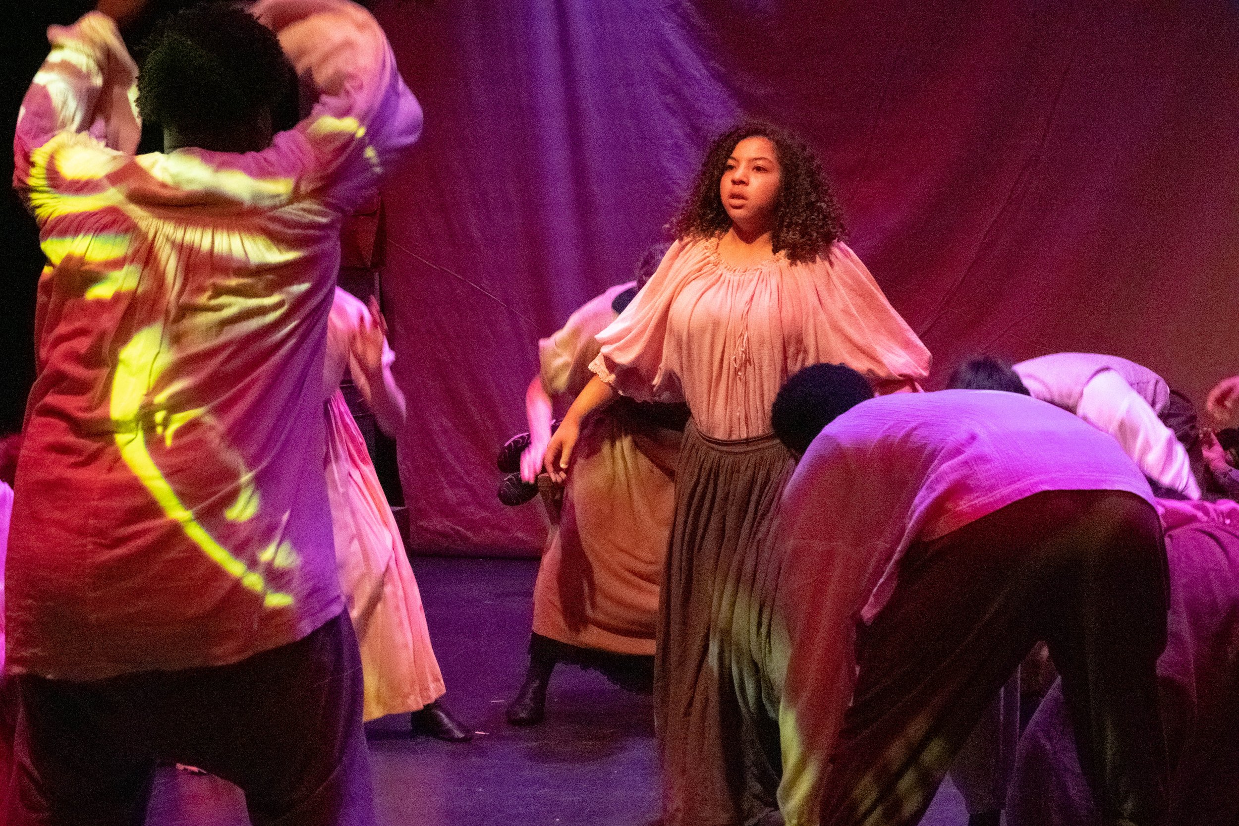  The cast performs a dance during the play "By The River Rivanna," performed on Tuesday Oct. 17th, 2023 in Santa Monica, Calif. at the Santa Monica Colllege Studio Stage. Cosette okker is seen standing in the middle. (Akemi Rico | The Corsair) 