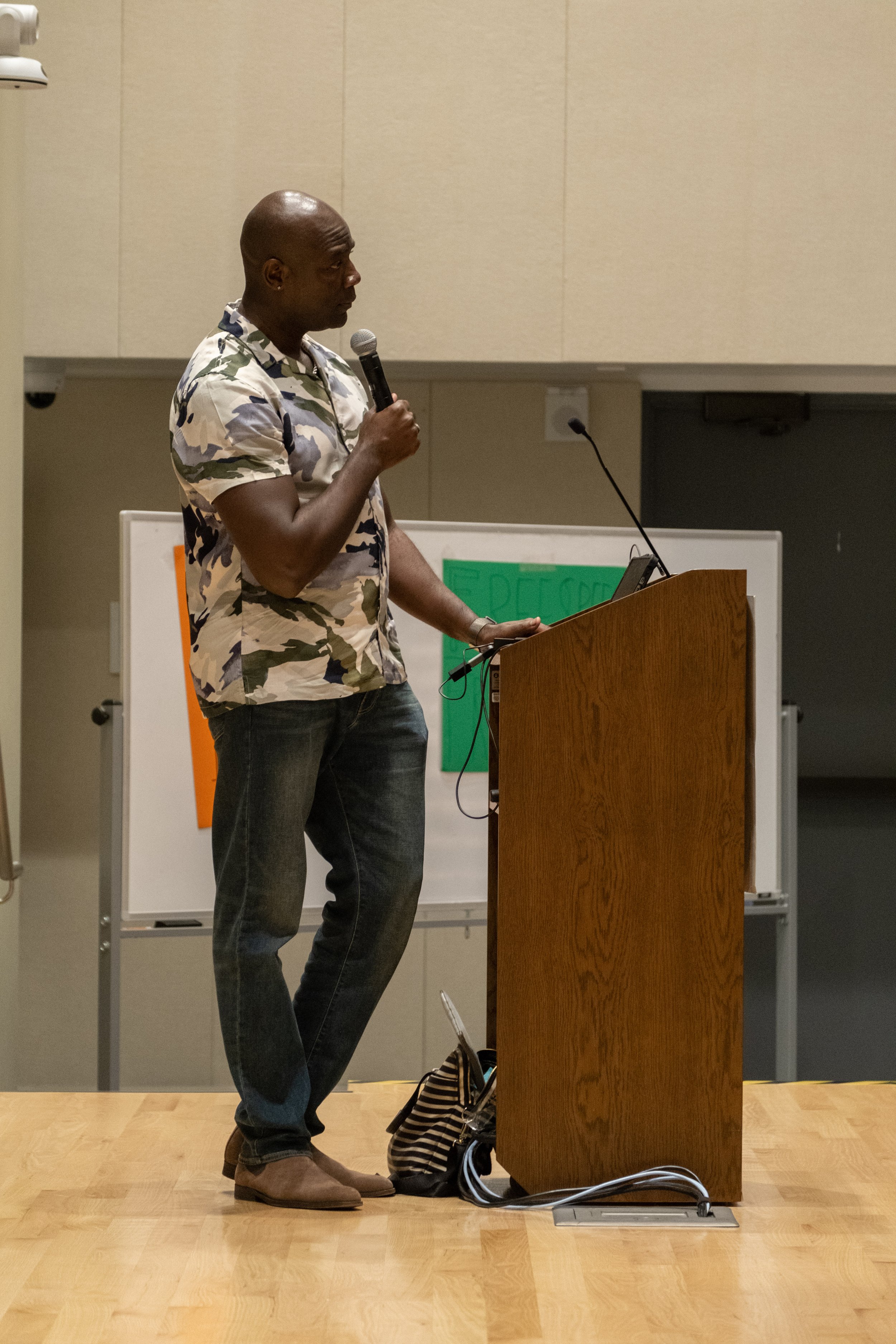  Dr. Jermaine Junius, president of the Pan African Alliance, address the audience at the community gathering in lieu of a protest against the play "By The River Rivanna" in the Student Services Orientation Hall on the main campus at Santa Monica Coll