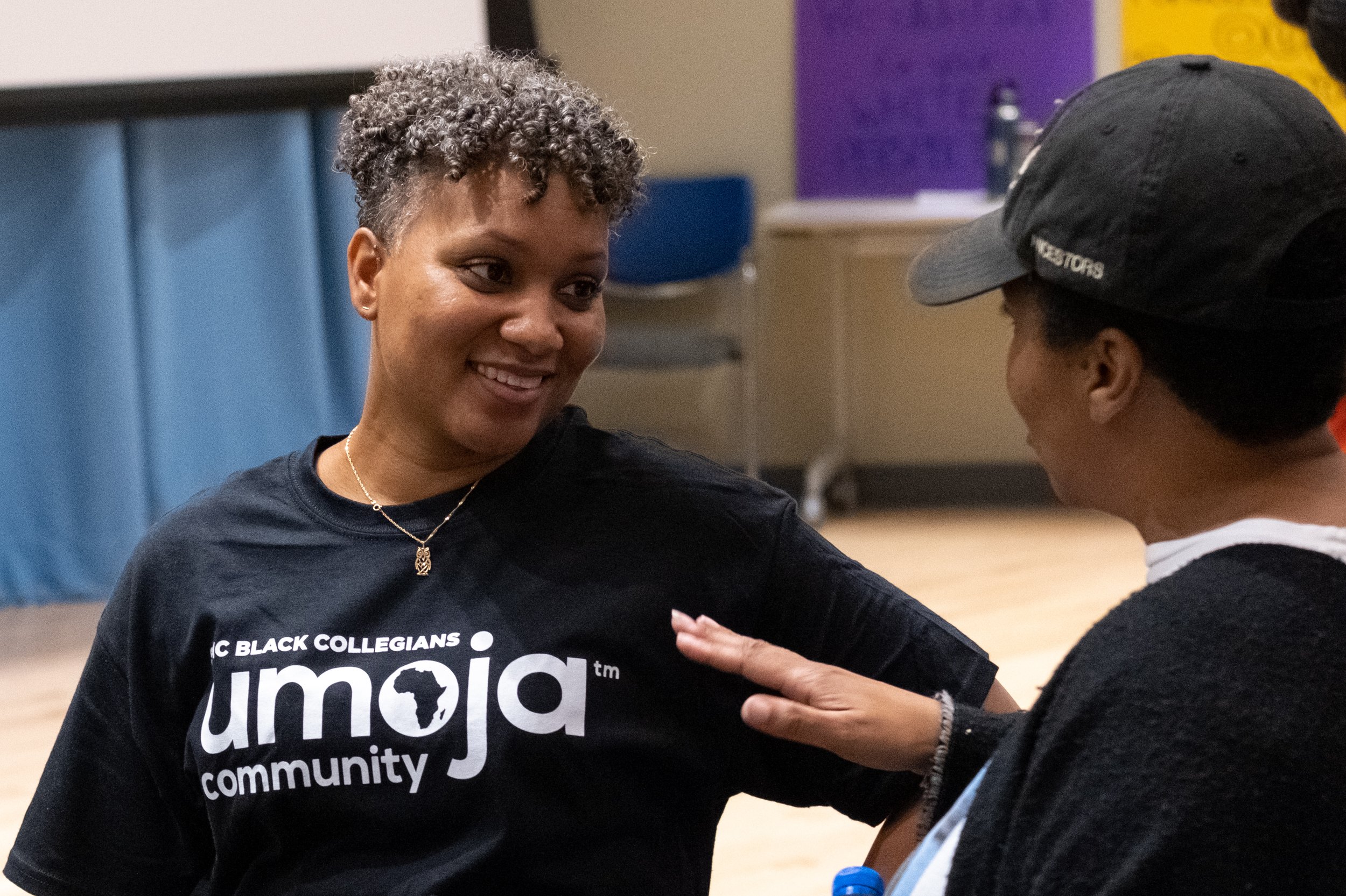  From L to R, Jocelyn Wynn and Nicole Woodard in conversation and community at the community gathering in lieu of a protest against the play "By The River Rivanna" in the Student Services Orientation Hall on the main campus at Santa Monica College in