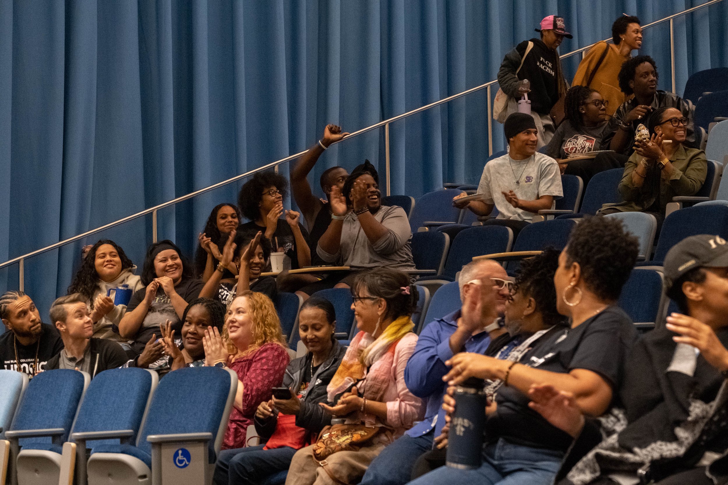  Audience applause at the community gathering in lieu of a protest against the play "By The River Rivanna" in the Student Services Orientation Hall on the main campus at Santa Monica College in Santa Monica, Calif. on Friday, Oct. 20, 2023. 