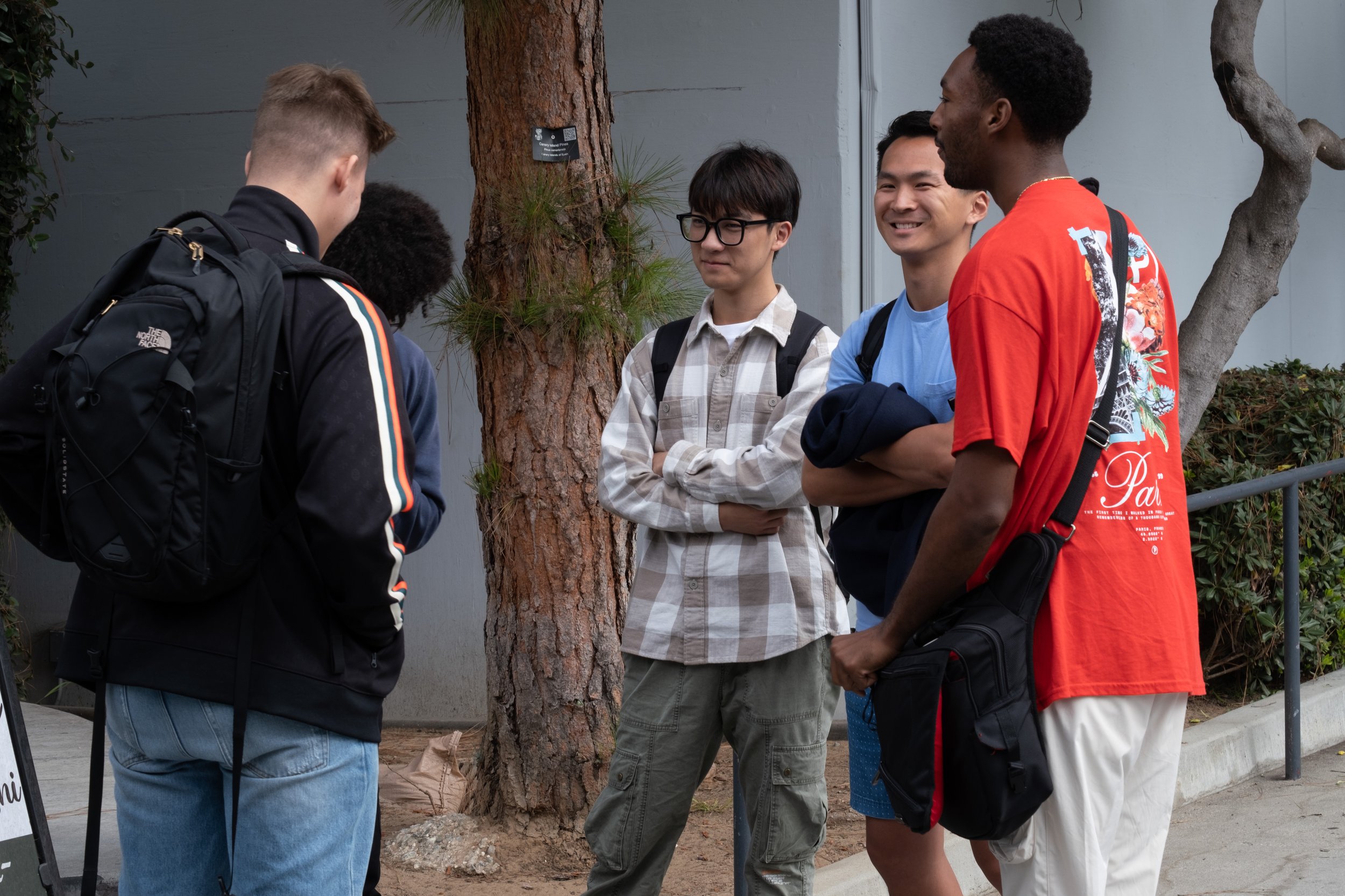  A group of friends gathered outside the cafeteria during the Great Shake Out on Thursday, Oct. 19, 2023 on the main campus of Santa Monica College in Santa Monica, Calif. From L to R: Alex Gorelik, chemistry major; Yusef Abdul Mohaimin, civil engine