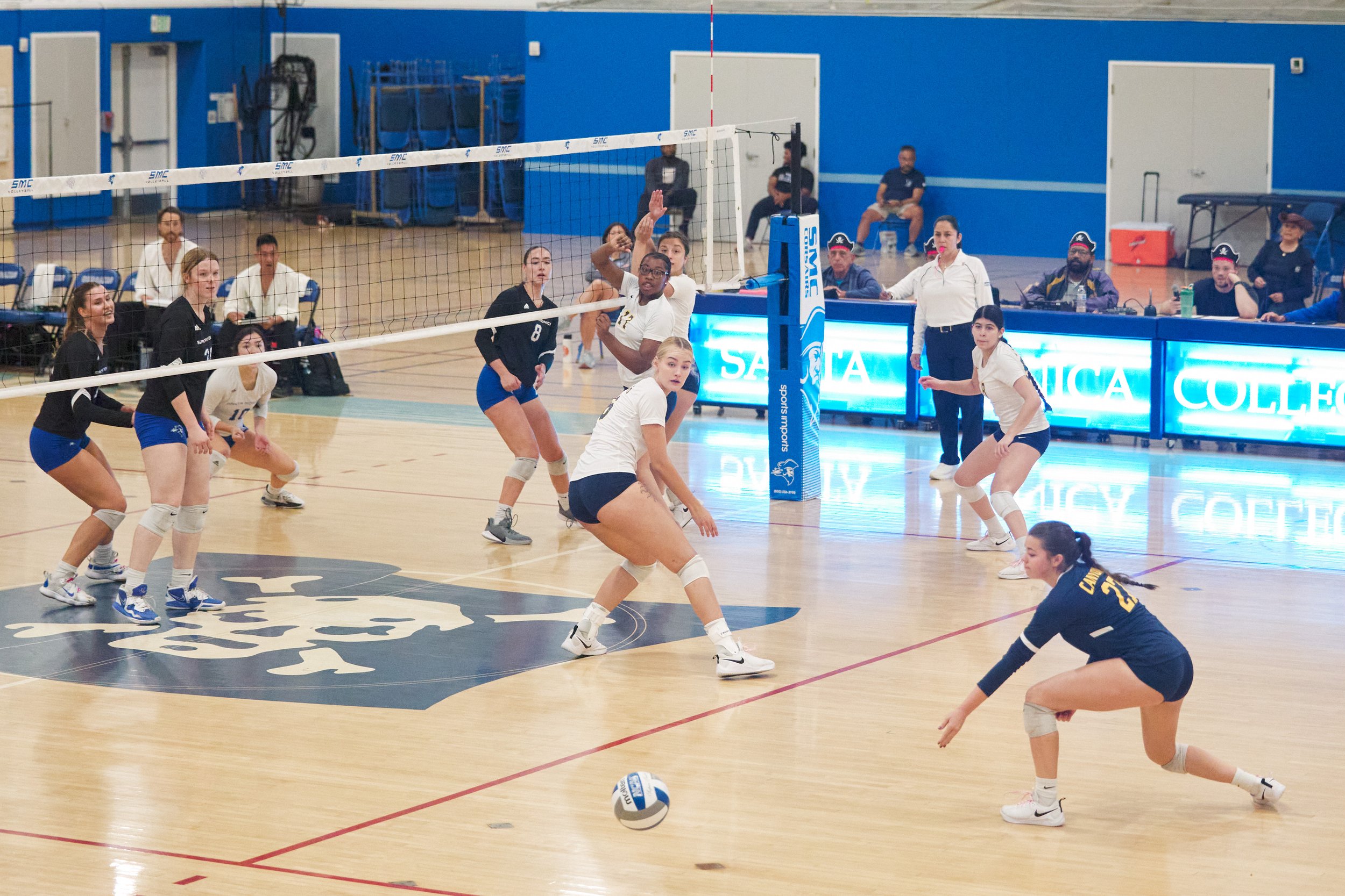  All players watch the ball during the women's volleyball match between the Santa Monica College Corsairs and the College of the Canyons Cougars on Friday, Oct. 27, 2023, at Corsair Gym in Santa Monica, Calif. The Corsairs won 3-0. (Nicholas McCall |