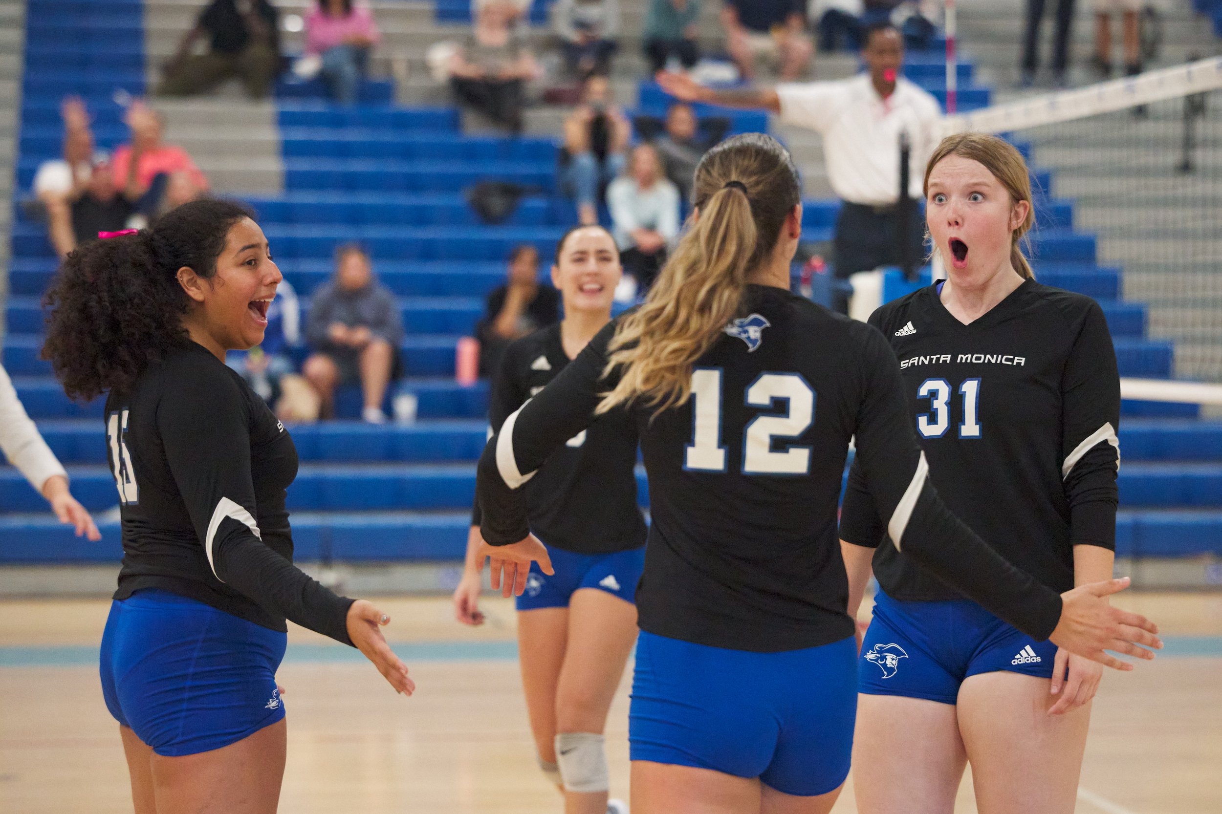  Santa Monica College Corsairs' Jaylynn Fierro, Natalie Fernandez, Mia Paulson, and Mylah Niksa react to scoring a point during the women's volleyball match against the College of the Canyons Cougars on Friday, Oct. 27, 2023, at Corsair Gym in Santa 