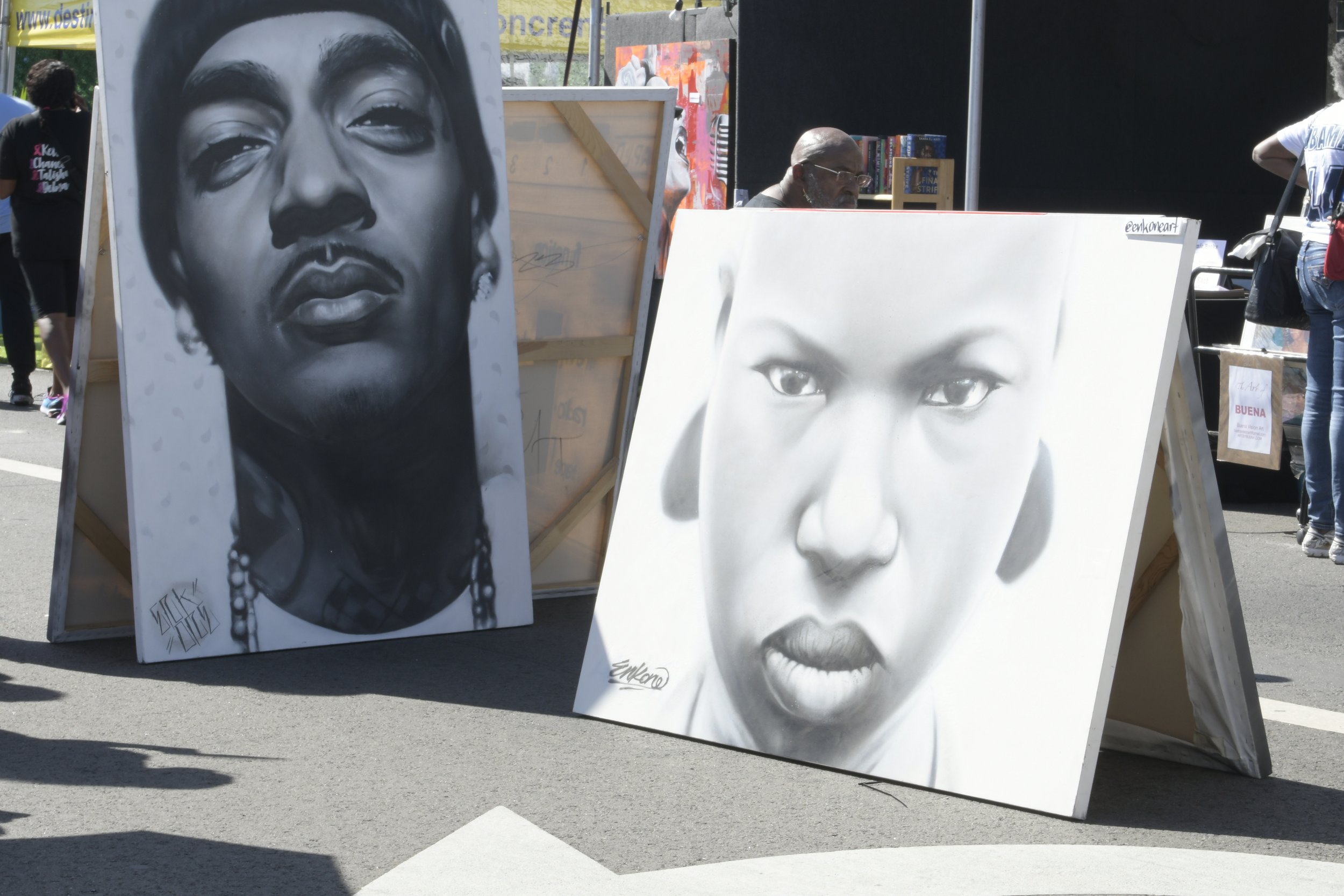  Paintings on display for sale at the Taste of Soul festival, giving people an opportunity to take a piece of art home with them. (Mikey Duro | The Corsair) 