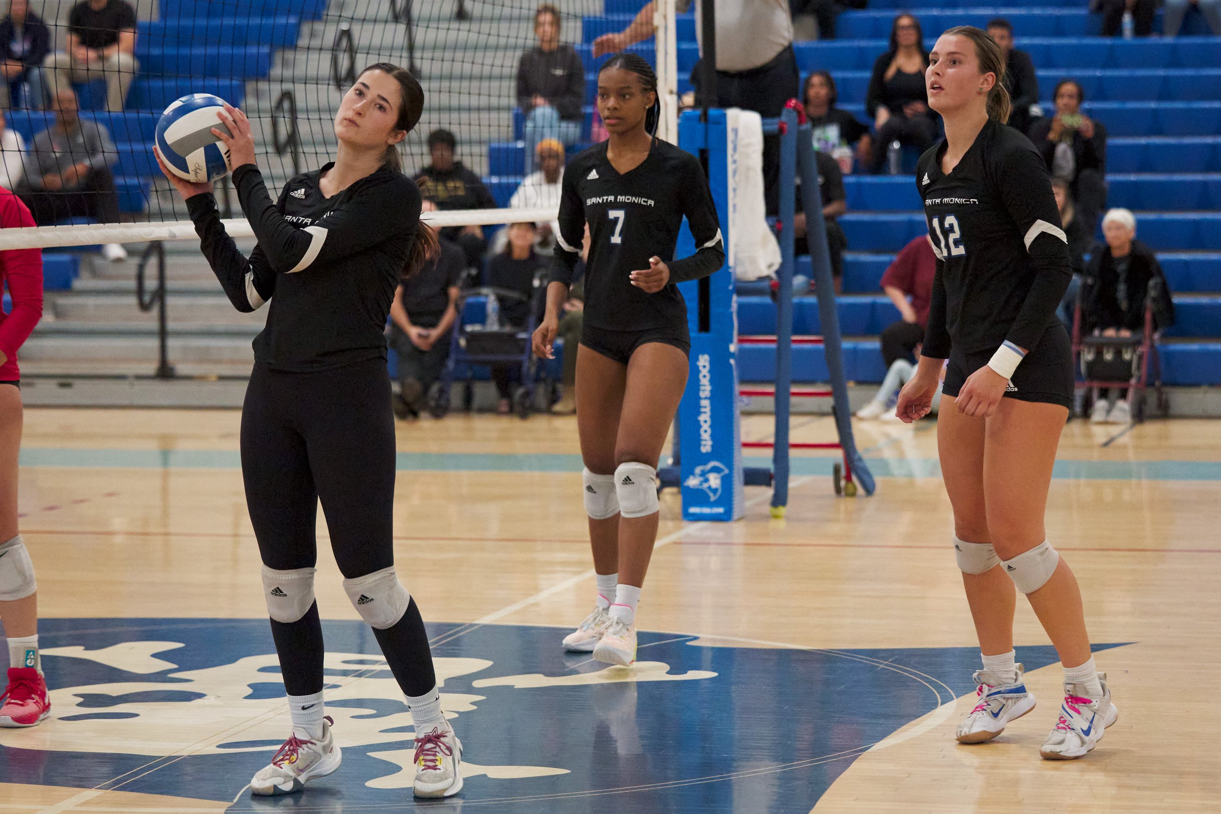  Santa Monica College Corsairs' Maiella Riva, next to Zarha Stanton and Mia Paulson, takes the ball after the Bakersfield College Renegades scored a point during the women's volleyball match on Wednesday, Nov. 1, 2023, at Corsair Gym in Santa Monica,