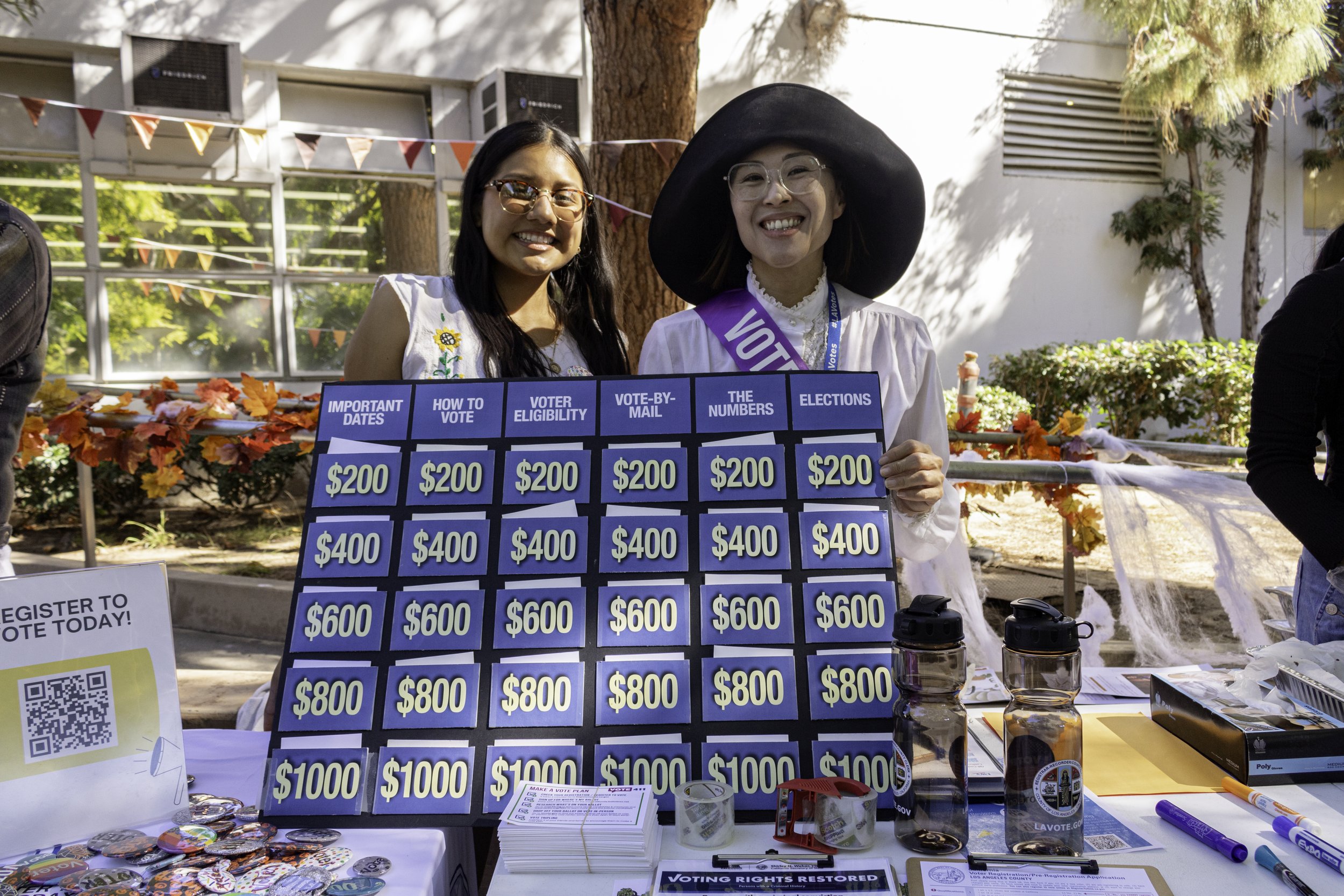  Santa Monica College, League of Women Voters Club Esmeralda Hernandez (Left) and Valerie Morishige smiles to the photographer during Club Row on Oct. 31, 2023 in Santa Monica, Cali. (Kevin Mendoza | The Corsair) 