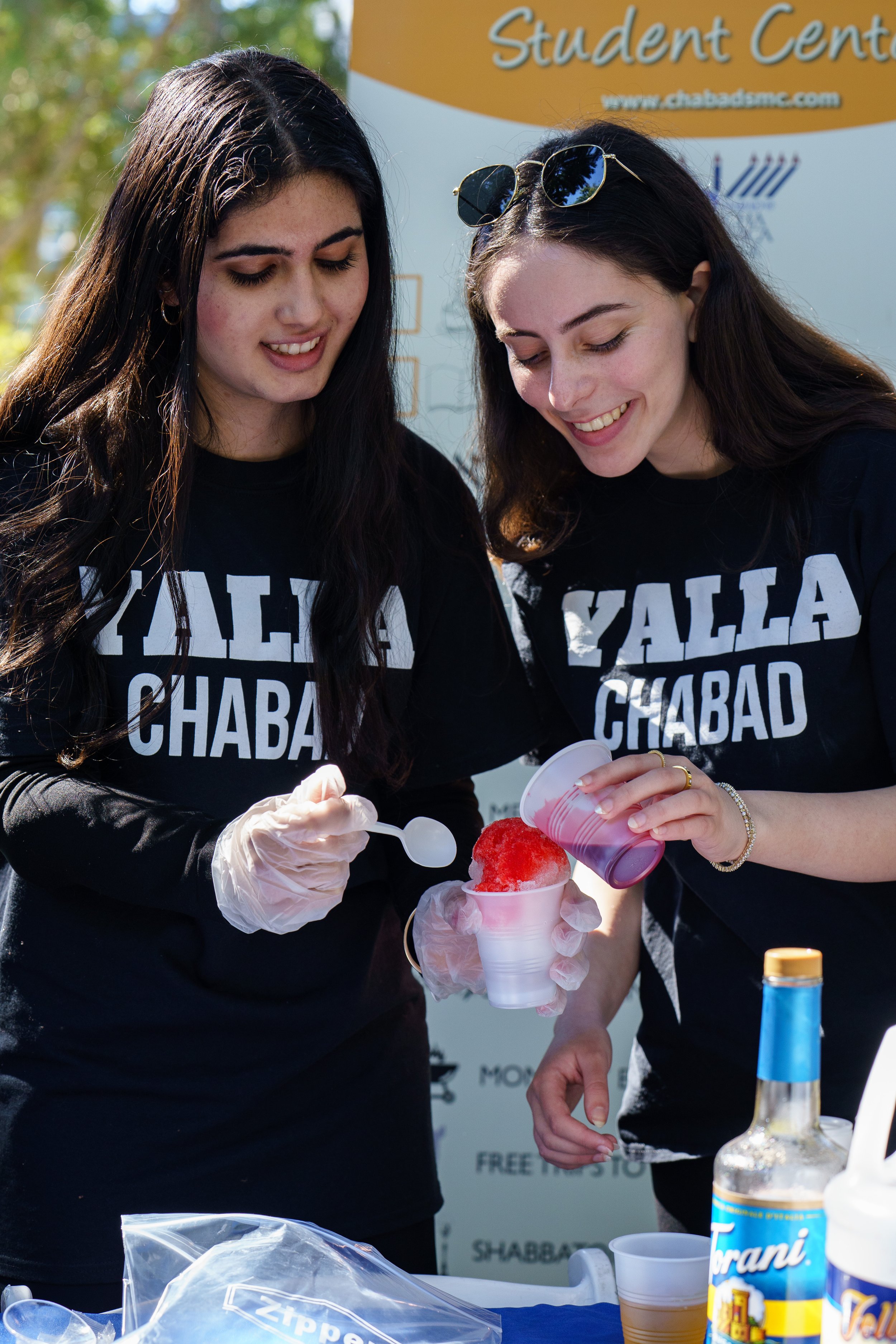  Santa Monica College's Chabad Jewish Student Club gives out shaved ice at the Club Row event on Halloween Tuesday, Oct. 31st, 2023 in Santa Monica, Calif. (Elizabeth Bacher | The Corsair) 