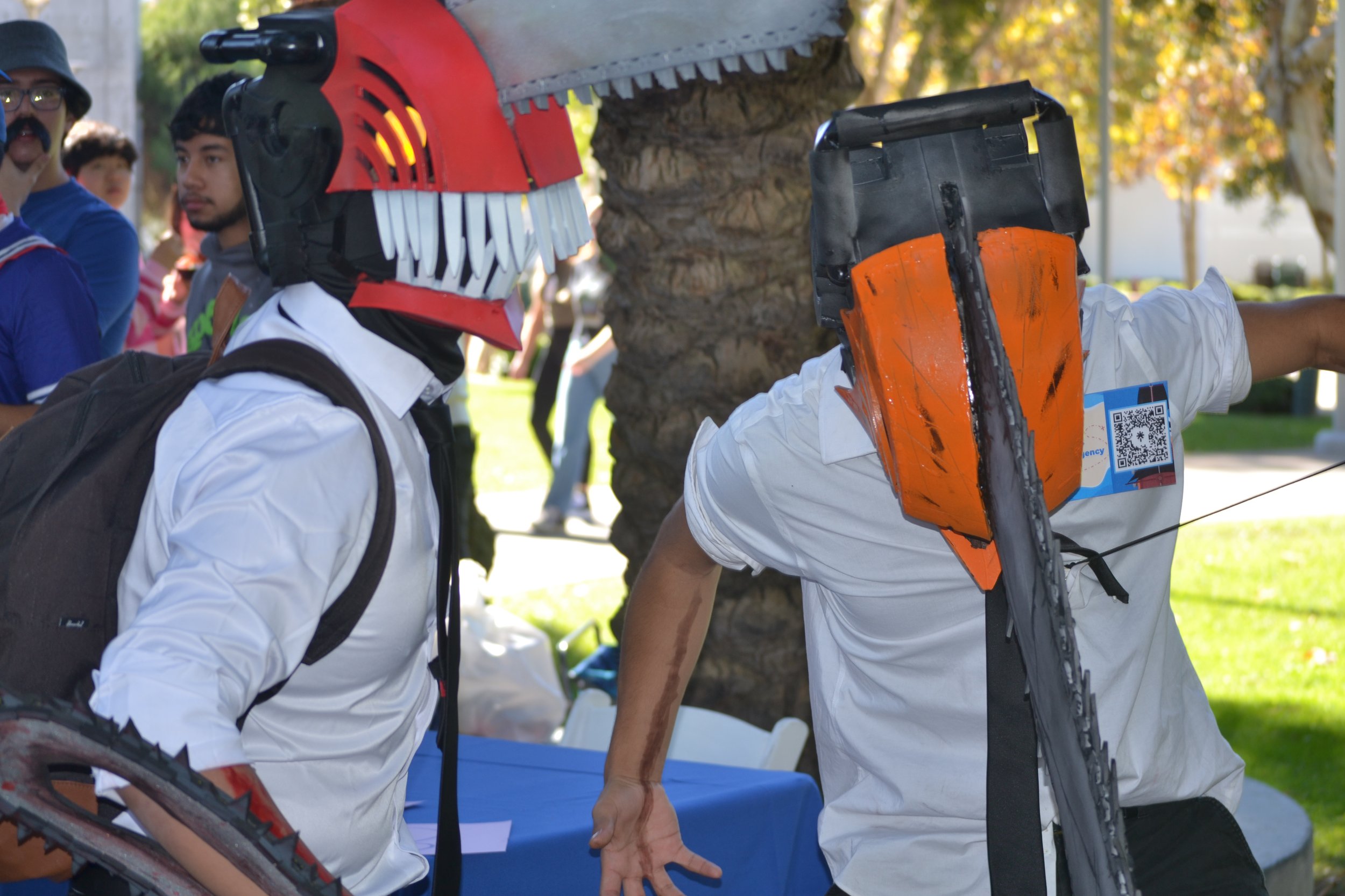  Jeb Austria (left) and Joseph Munoz (right) from The Pathfinders Creative Agency Marketing Club both cosplays as "Denji" from a anime "Chainsaw Man" at Santa Monica College's Club Row event at Santa Monica, Calif. on Tuesday, October 31, 2023 (Aminn