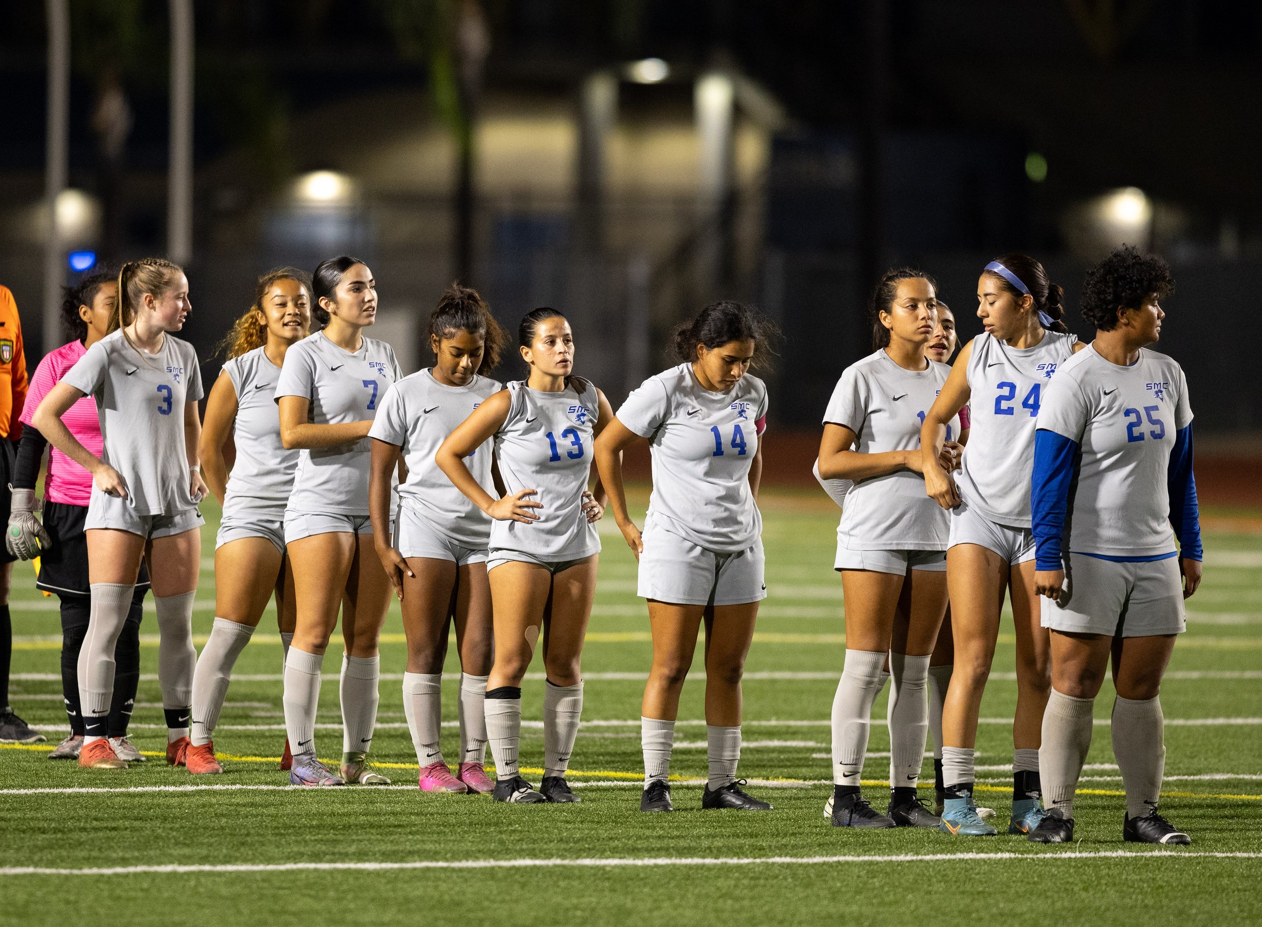  Santa Monica College's women's soccer starting 11 prepairing for the national anthem before they face off the Citrus College Owls on Friday, Nov. 9 at the Citrus College Stadium in Azusa, Calif. (Danilo Perez | The Corsair) 