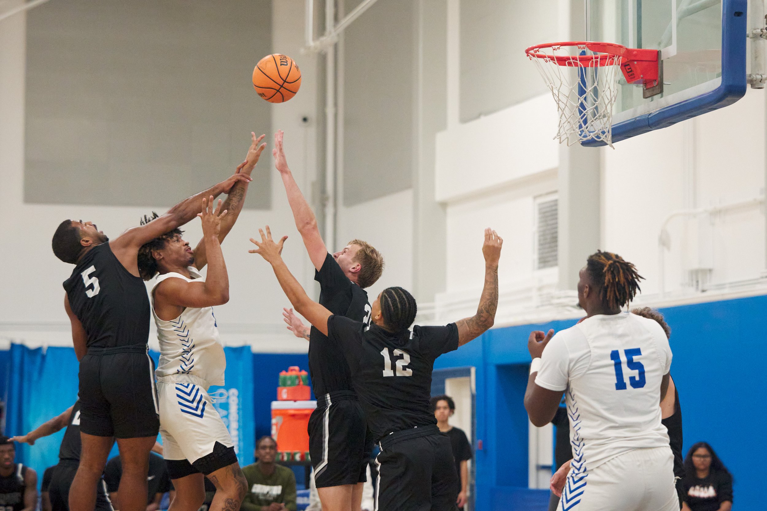  Santa Monica College Corsairs' Elijah Scranton (second from left) shoots for a goal during the men's basketball game against the Compton College Tartars on Wednesday, Nov. 8, 2023, at Corsair Gym in Santa Monica, Calif. The Corsairs won 94-86. (Nich