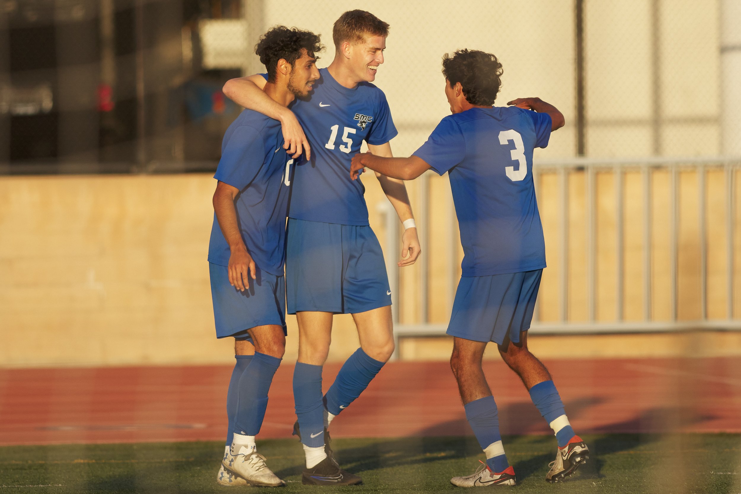  Santa Monica College Corsairs' Roey Kivity, Edan Lazarovich, and Luis Rodriguez gather after Lazarovich's first of three goals during the men's soccer game against the Allan Hancock College Bulldogs on Tuesday, Nov. 7, 2023, at Corsair Field in Sant