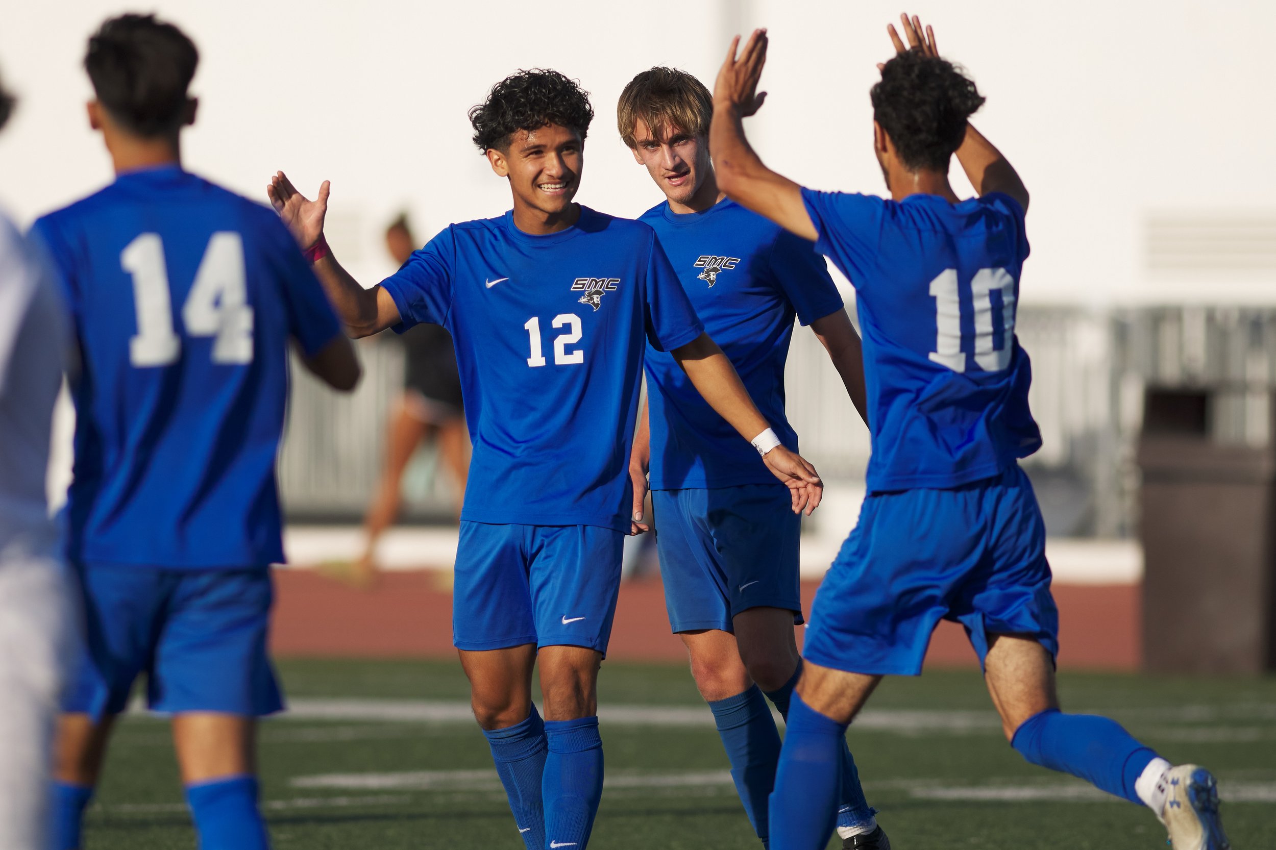  Santa Monica College Corsairs' Jason Moreno, Darren Lewis, and Roey Kivity gather after Moreno's goal during the men's soccer match against the Moorpark College Raiders on Thursday, Nov. 9, 2023, at Corsair Field in Santa Monica, Calif. The Corsairs
