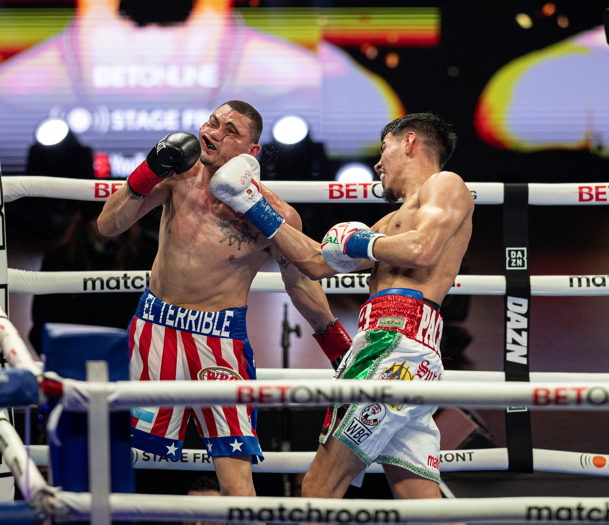  Diego Pacheco(R) uppercutting Marcelo Coceres(L) for the knockout to extend his record 20-0. Pacheco and Coceres fought for the WBO International and USWBC Super-Bantamweight titles in YouTube Theater at Inglewood, Calif. on Saturday, Nov. 18. (Dani