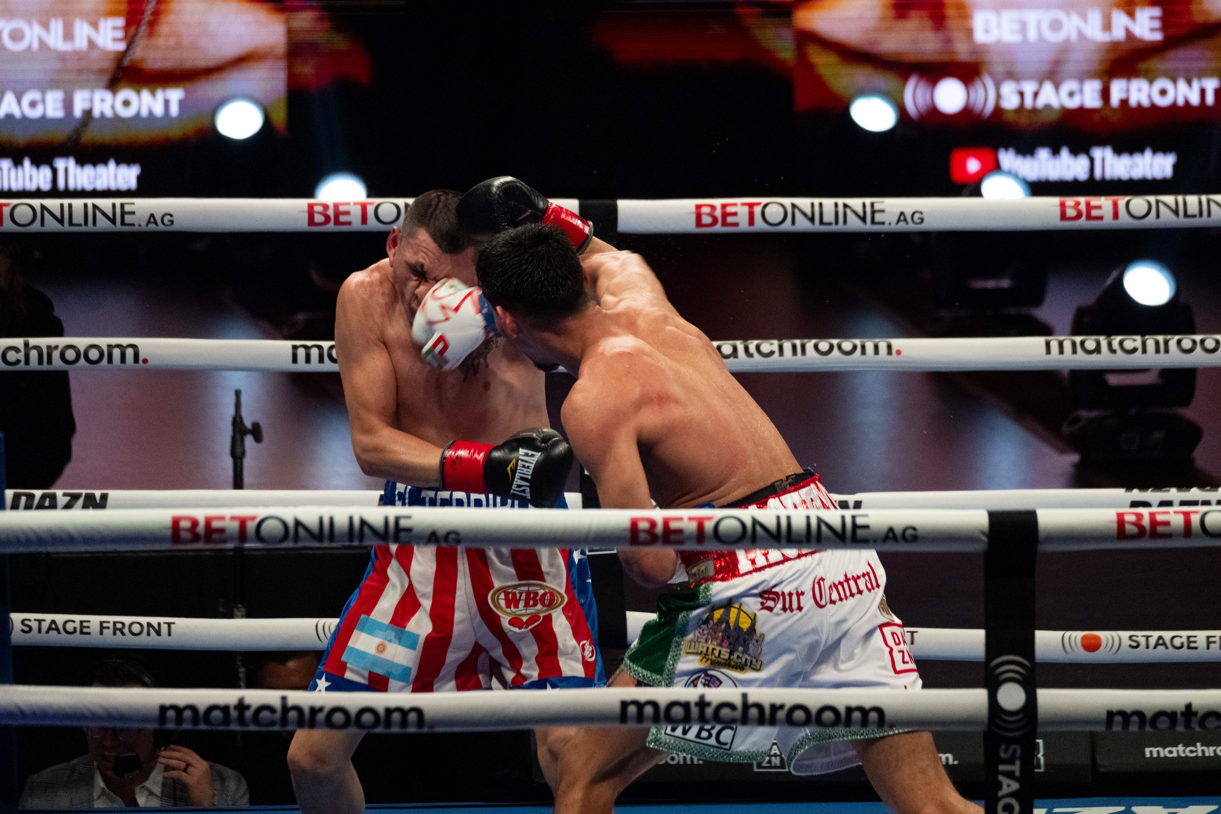  Diego Pacheco(R) landing a hit on Marcelo Coceres’s face during their battle for the WBO International and USWBC Super-Bantamweight title. Pacheco came out victorious after a knockout to keep Pacheco the reigning WBO International and USWBC Super-Ba