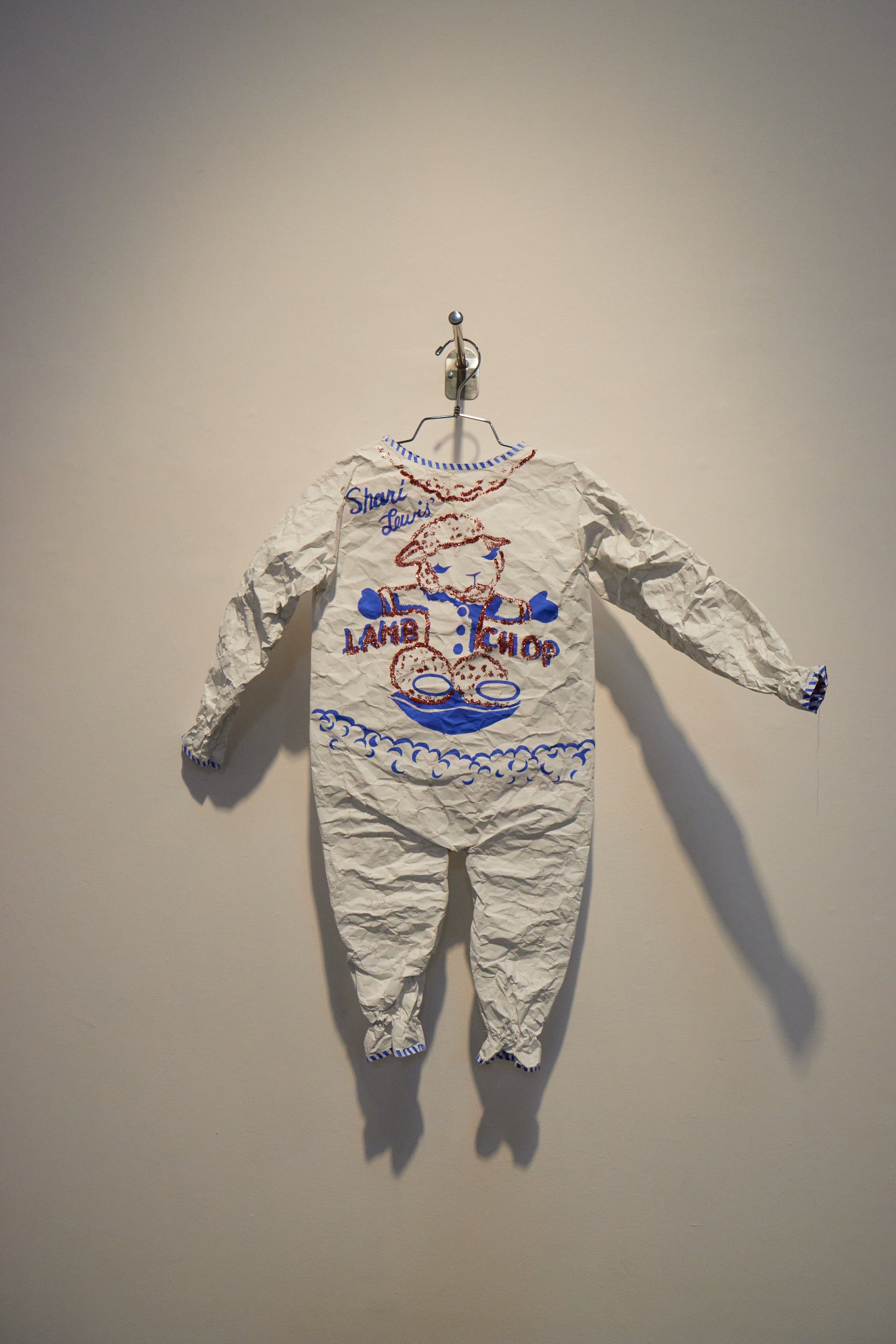  Shari Lewis' Lamb Chop baby clothes from Phranc's childhood in her art exhibition The Butch Closet in Craig Krull Gallery at Bergamot Station Arts Center, Santa Monica, Calif., on Nov. 4, 2023. The clothes that have been displayed were meticulously 