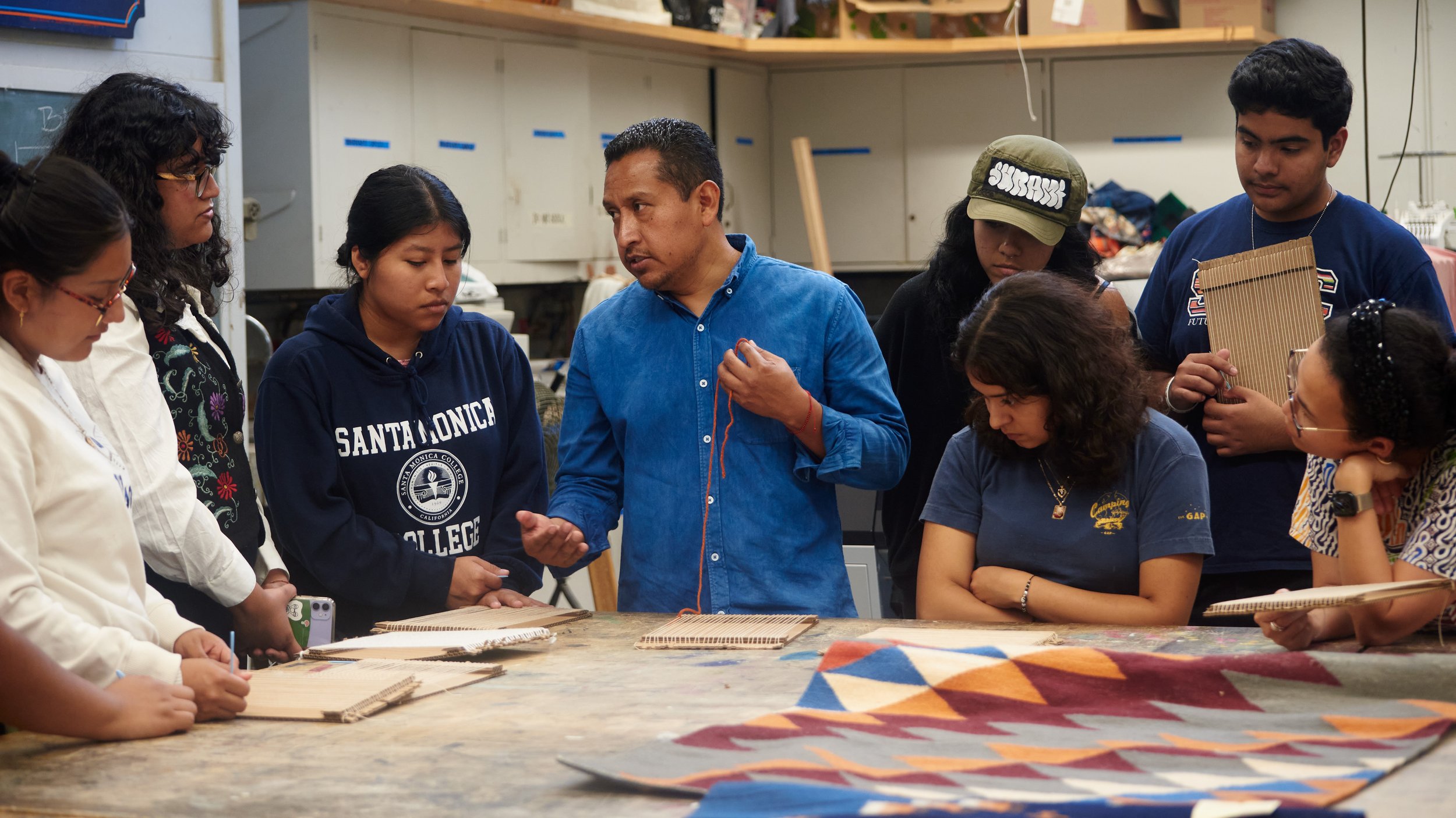  Weaver and textile artist Porfirio Gutierrez demonstrates weaving during his workshop on Thursday, Oct. 12, 2023, at Santa Monica College in Santa Monica, Calif. (Nicholas McCall | The Corsair) 